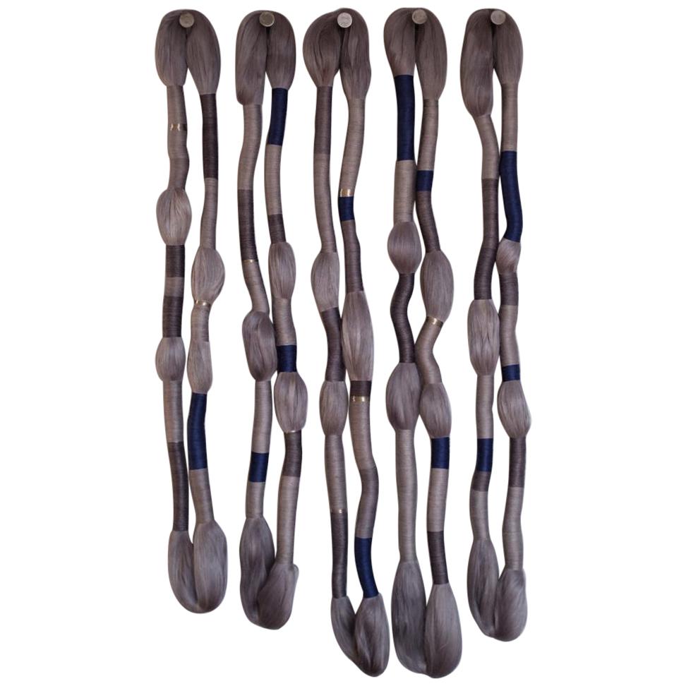 Meditación en Loop 4: Oda a Alberto. Profundidad is six vertically hanging wall sculptures made of Fique,a natural fibre that grows in the leaves of the fique plant, Furcraea andina, a xerophytic monocot native to Andean regions of Colombia,