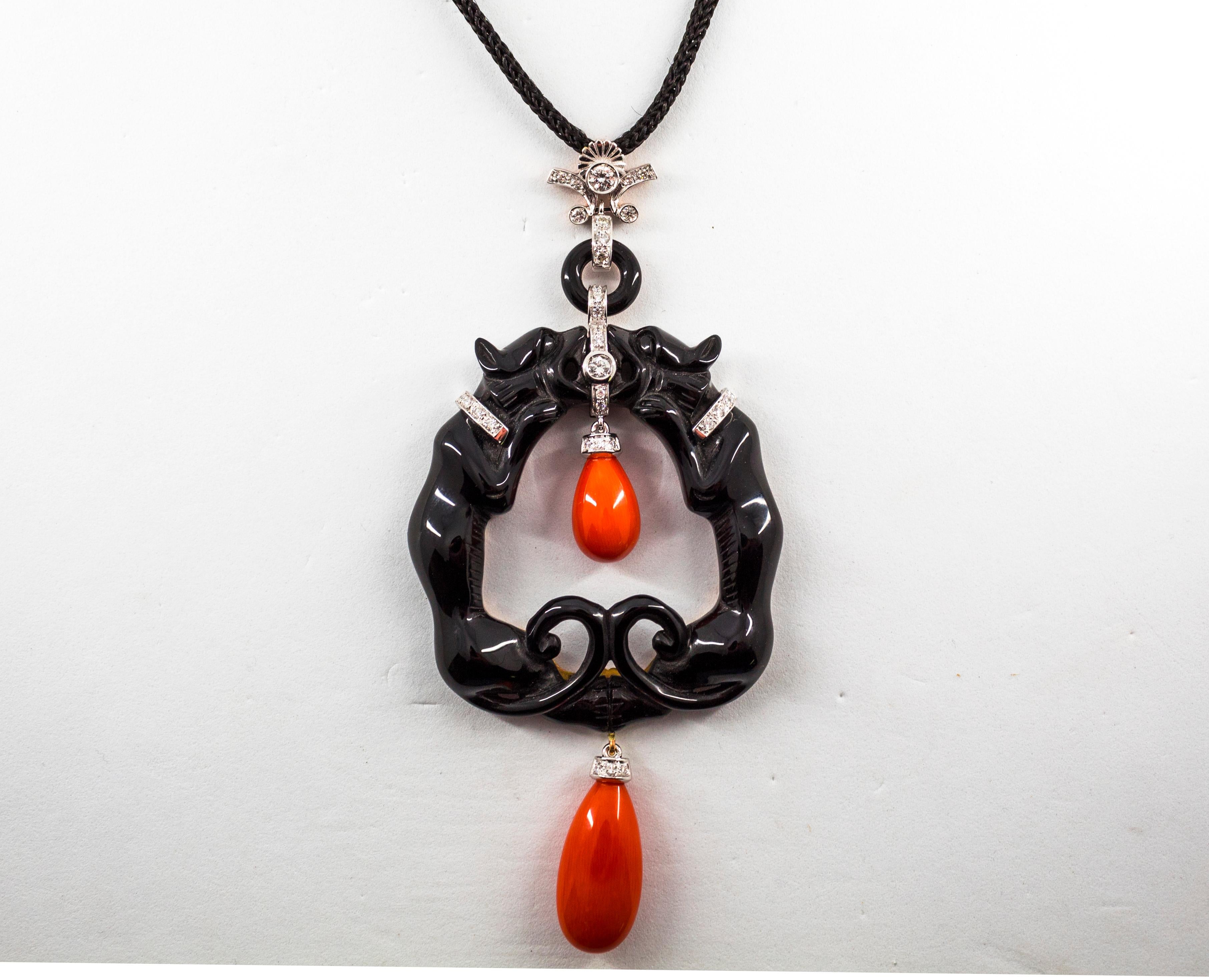 This Necklace is made of 18K White Gold and Onyx.
This Necklace has 0.55 Carats of White Diamonds.
This Necklace has Mediterranean (Sardinia, Italy) Red Coral.
The Necklace length is 47cm.
We're a workshop so every piece is handmade, customizable