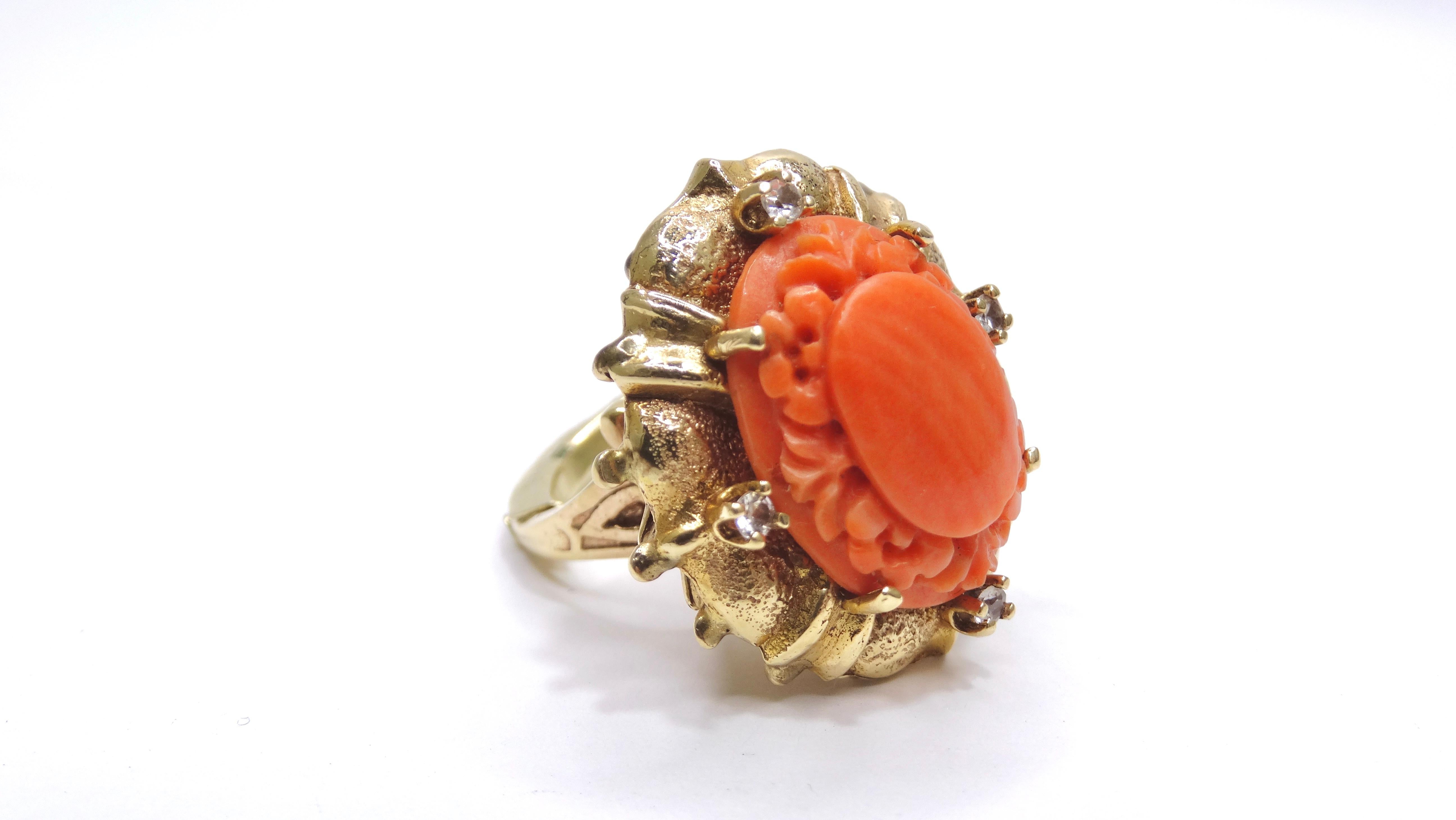 Look no further for your next collectors piece. Do not miss a single stunning detail. Made of intricately carved mediterranean coral (a little more than 10carat), 14k gold, and four diamonds. Mediterranean Coral is the most valuable of all precious