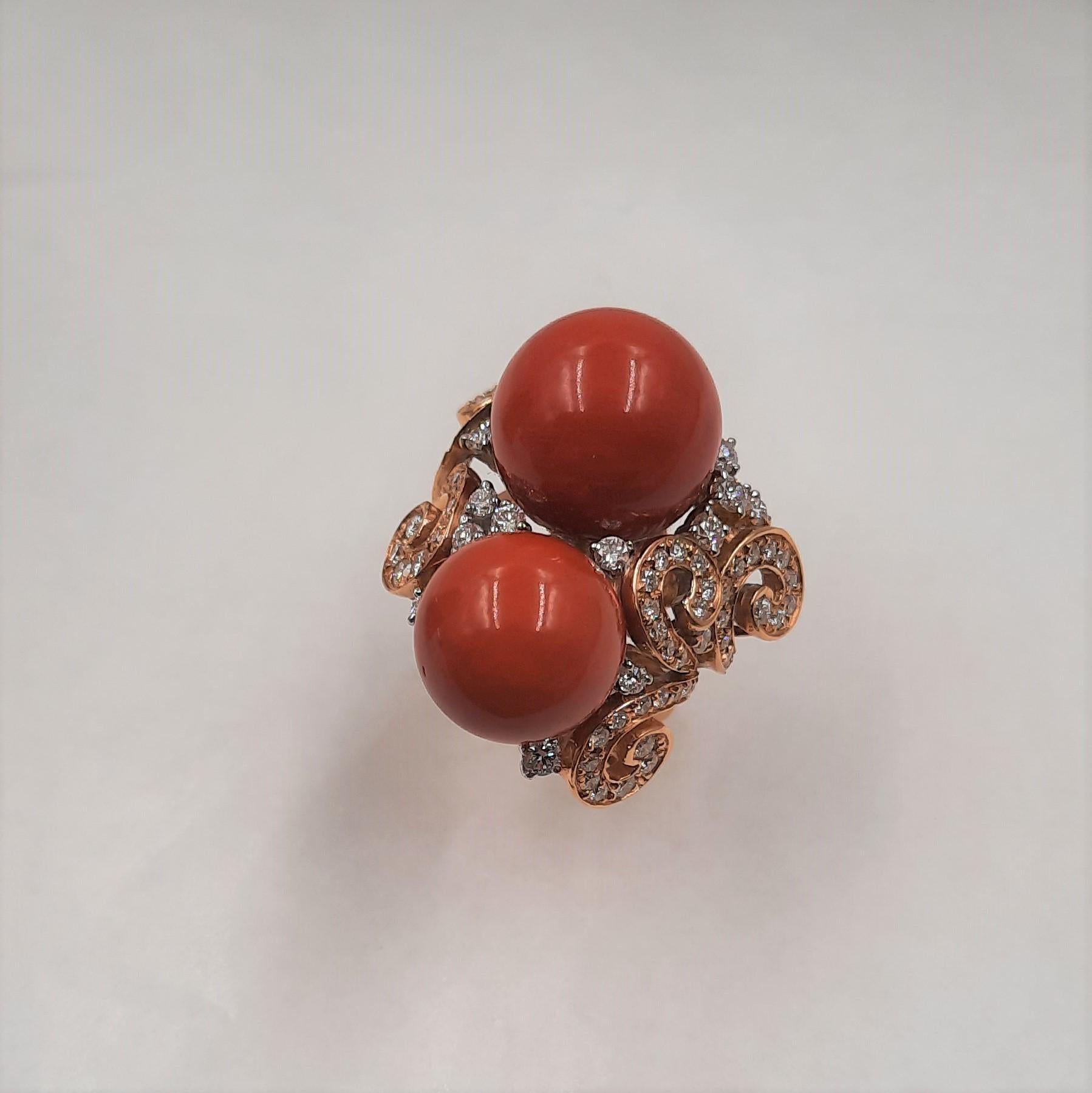 Exceptional Mediterranean coral (6.68 grams), Brilliant cut diamond (1.6 carats), 18 carats rose and white gold (11.7grams) cocktail ring. 
