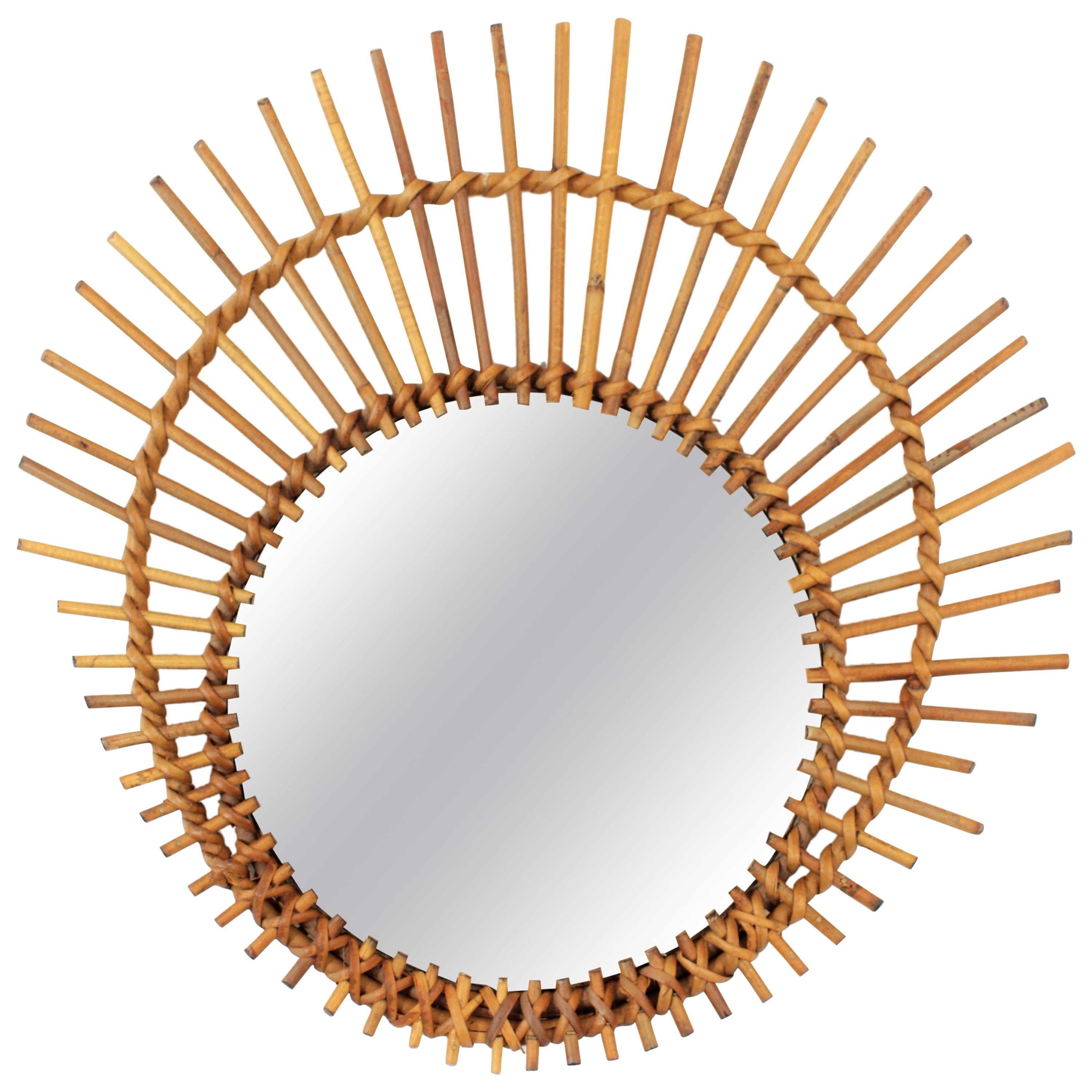 Mediterranean Rattan Wicker Asymmetric Ovoid Sunburst Mirror, France, 1960s