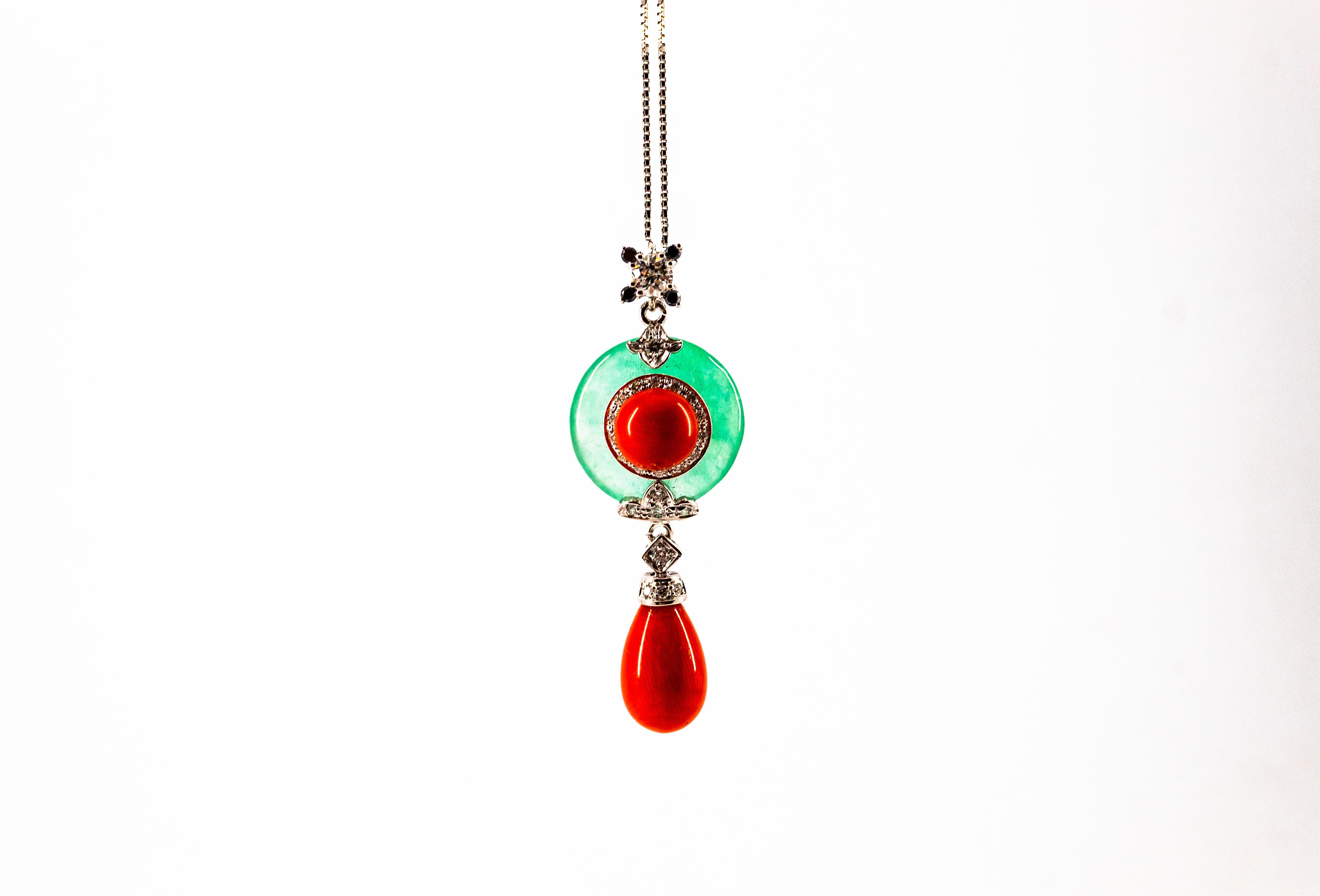 This Necklace is made of 14K White Gold.
This Necklace has 0.38 Carats of White Diamonds.
This Necklace has 0.04 Carats of Black Diamonds.
This Necklace has also Jade and Mediterranean (Sardinia, Italy) Red Coral.
Necklace Length is 42cm.
We're a