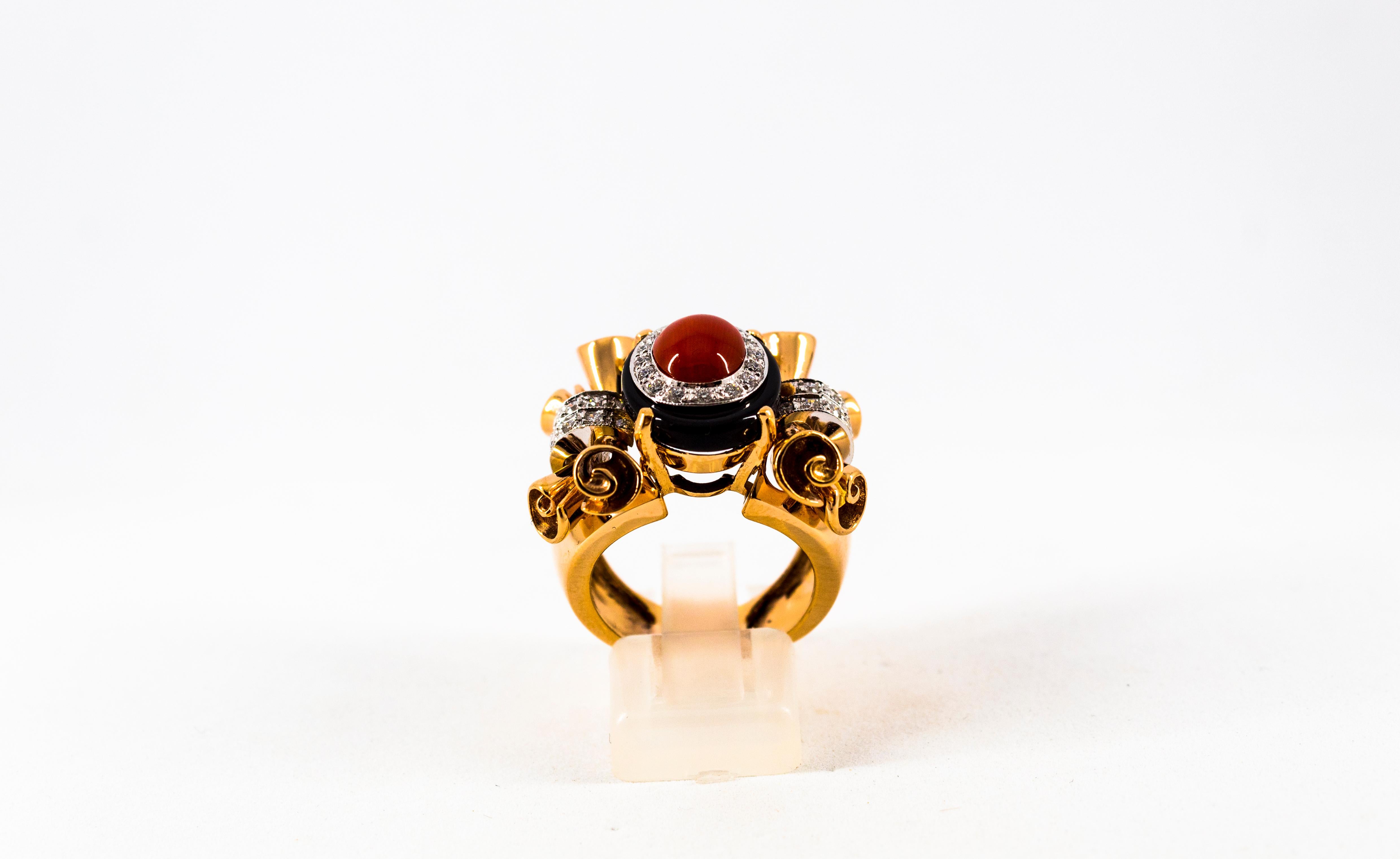 This Ring is made of 14K Yellow Gold.
This Ring has 0.47 Carats of White Diamonds.
This Ring has Red Mediterranean (Sardinia, Italy) Coral.
This Ring has also Onyx.
Size ITA: 14 USA: 6 3/4
This Ring is available also with a central Turquoise.
We're