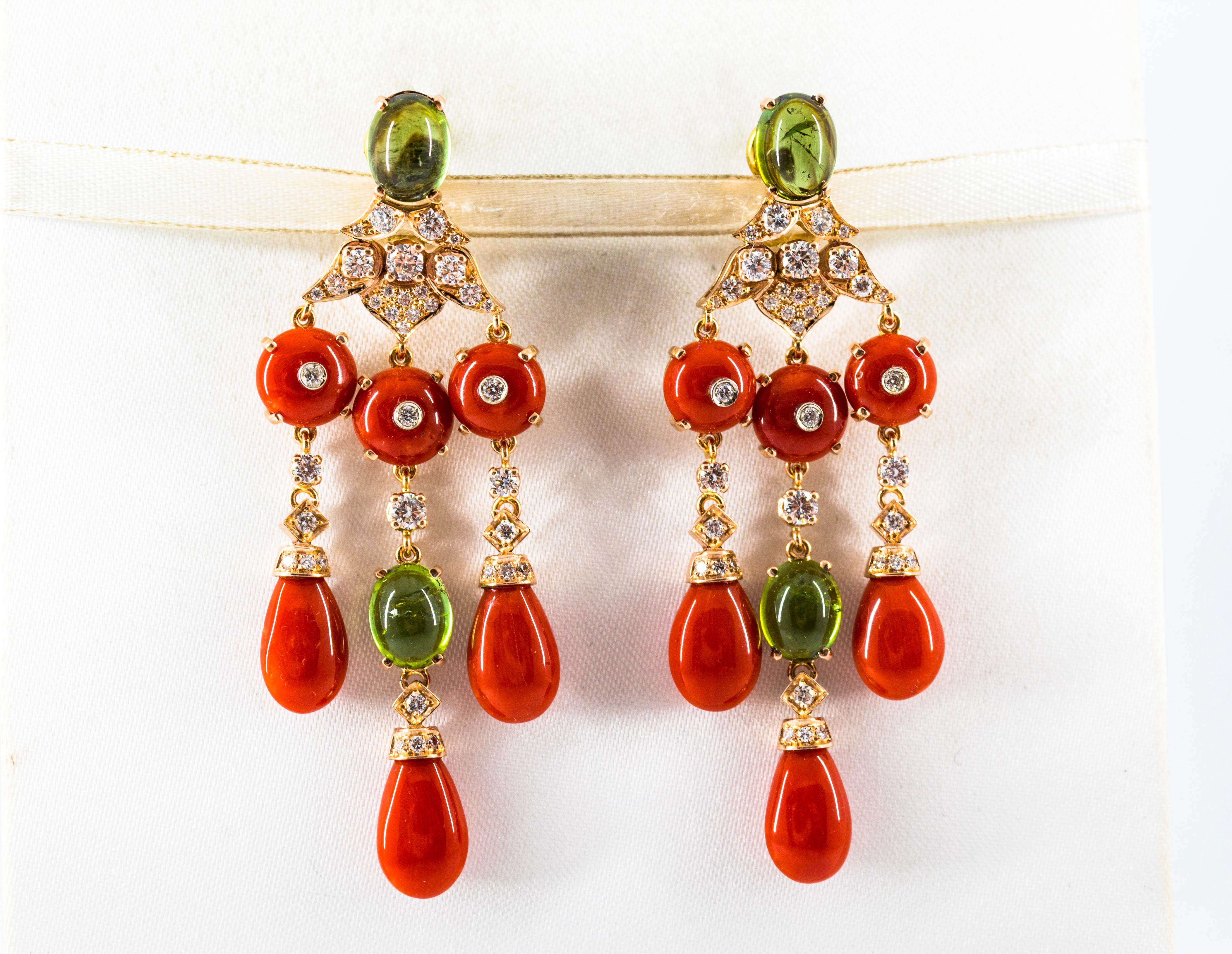 These Clip-On Drop Earrings are made of 14K Yellow Gold.
These Earrings have 1.80 Carats of White Modern Round Cut Diamonds.
These Earrings have 8.80 Carats of Green Cabochon Tourmalines.
These Earrings have Mediterranean (Sardinia, Italy) Red