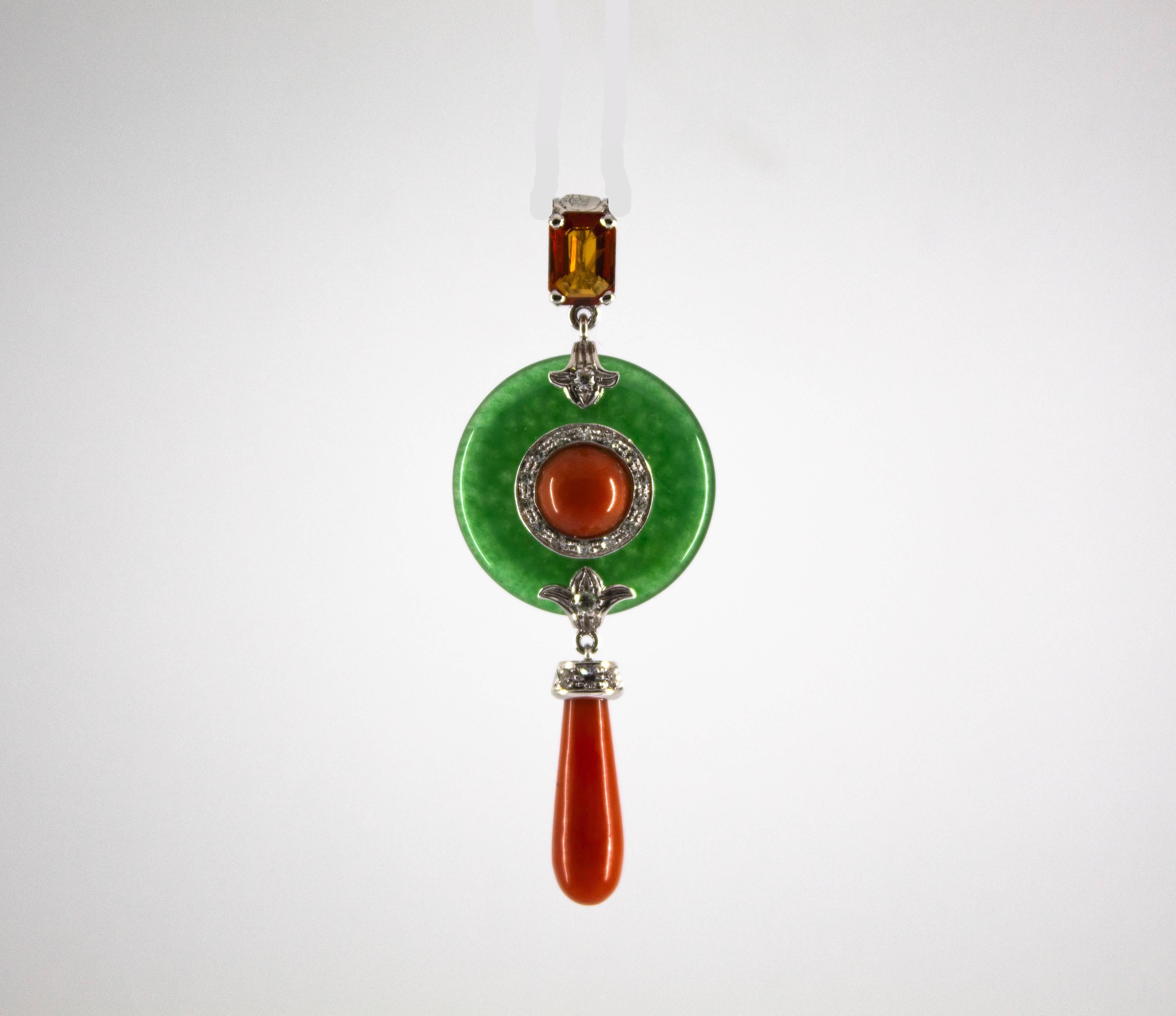 This Necklace is made of 14K White Gold.
This Necklace has 0.20 Carats of White Diamonds.
This Necklace has a 1.08 Carats Yellow Sapphire
This Necklace has also Jadeite and Mediterranean (Sardinia, Italy) Red Coral.
We're a workshop so every piece