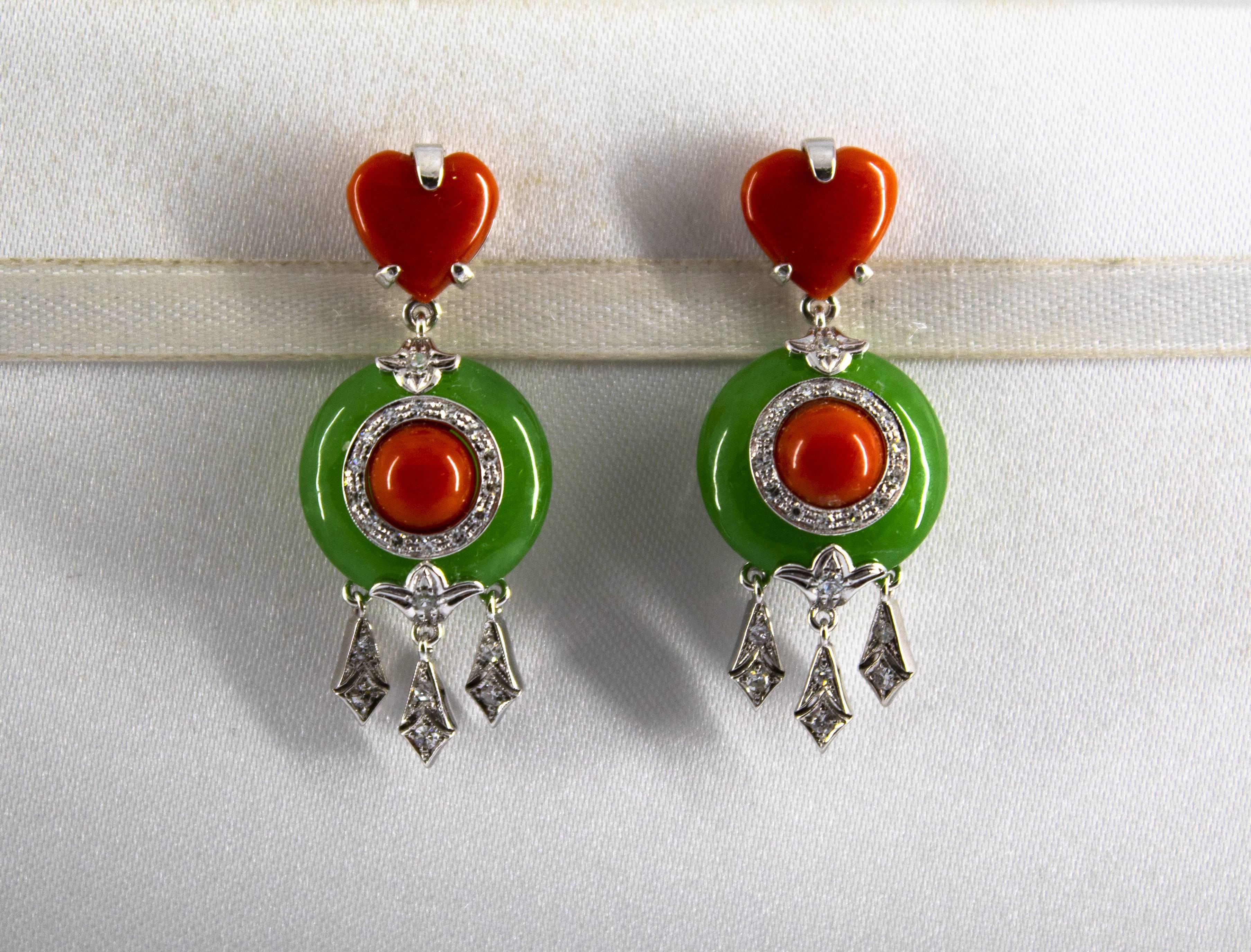 These Stud Earrings are made of 14K White Gold.
These Earrings have 0.30 Carats of White Diamonds.
These Earrings have also Mediterranean (Sardinia, Italy) Red Coral and Jadeite.
All our Earrings have pins for pierced ears but we can change the