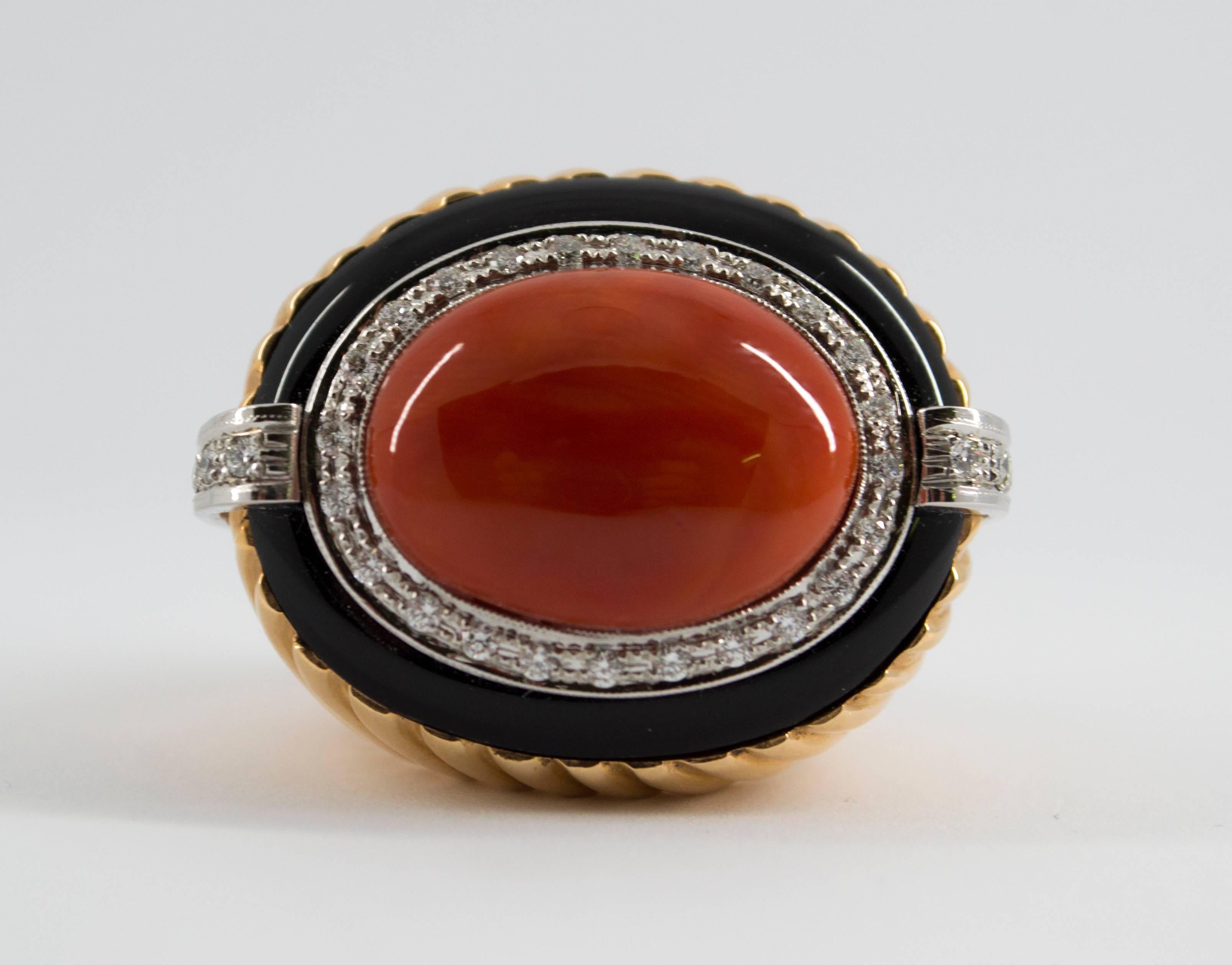 This Ring is made of 14K Yellow Gold.
This Ring has 0.50 Carats of Diamonds.
This Ring has also a big Red Mediterranean (Sardinia, Italy) Coral and Onyx.
This Ring is inspired by Renaissance Style.
Size ITA: 17 USA: 8
We're a workshop so every piece