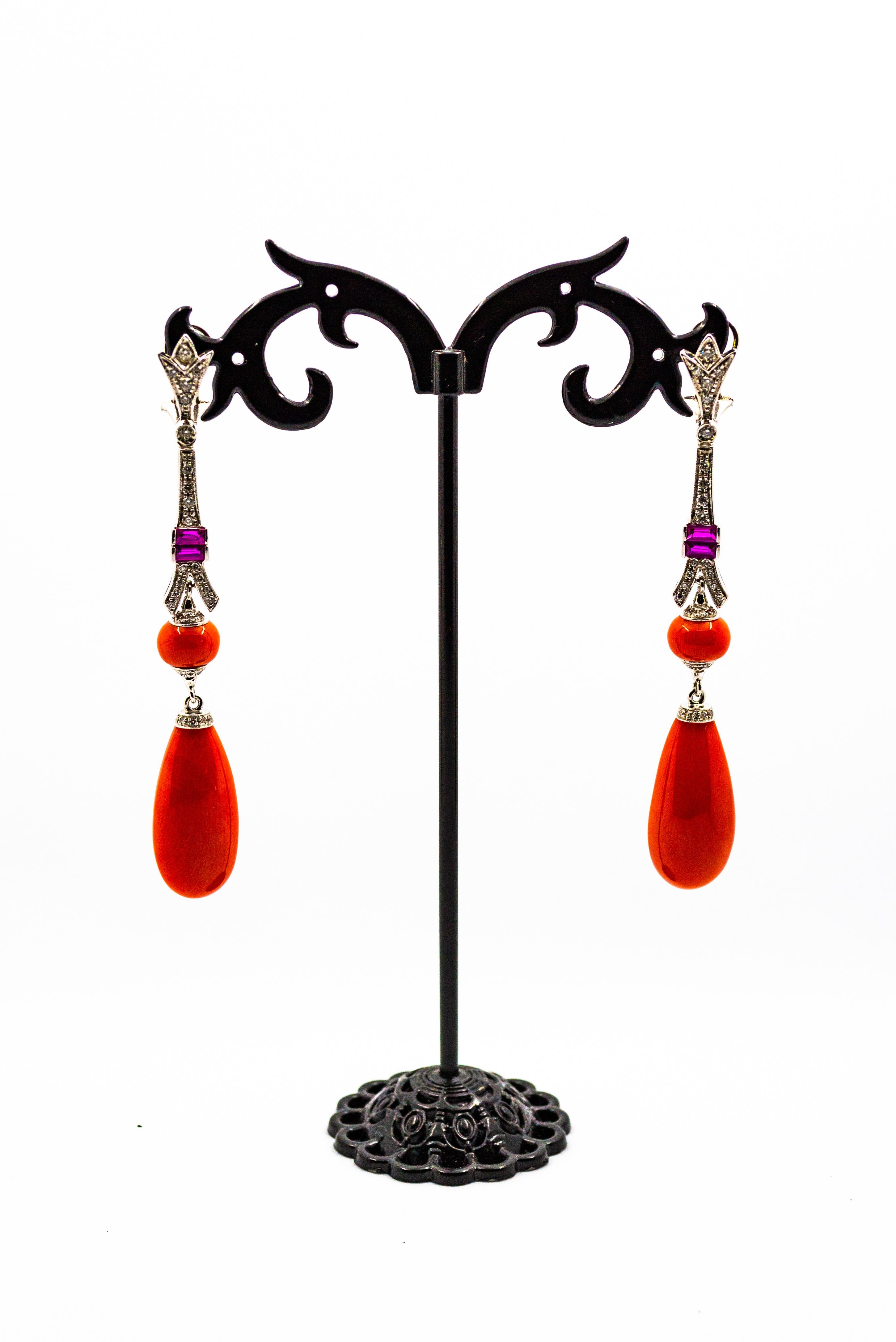 These Clip-On Earrings are made of 9K White Gold.
These Earrings have 0.90 Carats of White Diamonds.
These Earrings have Mediterranean (Sardinia, Italy) Red Coral and Amethyst.
All our Earrings have pins for pierced ears but we can change the