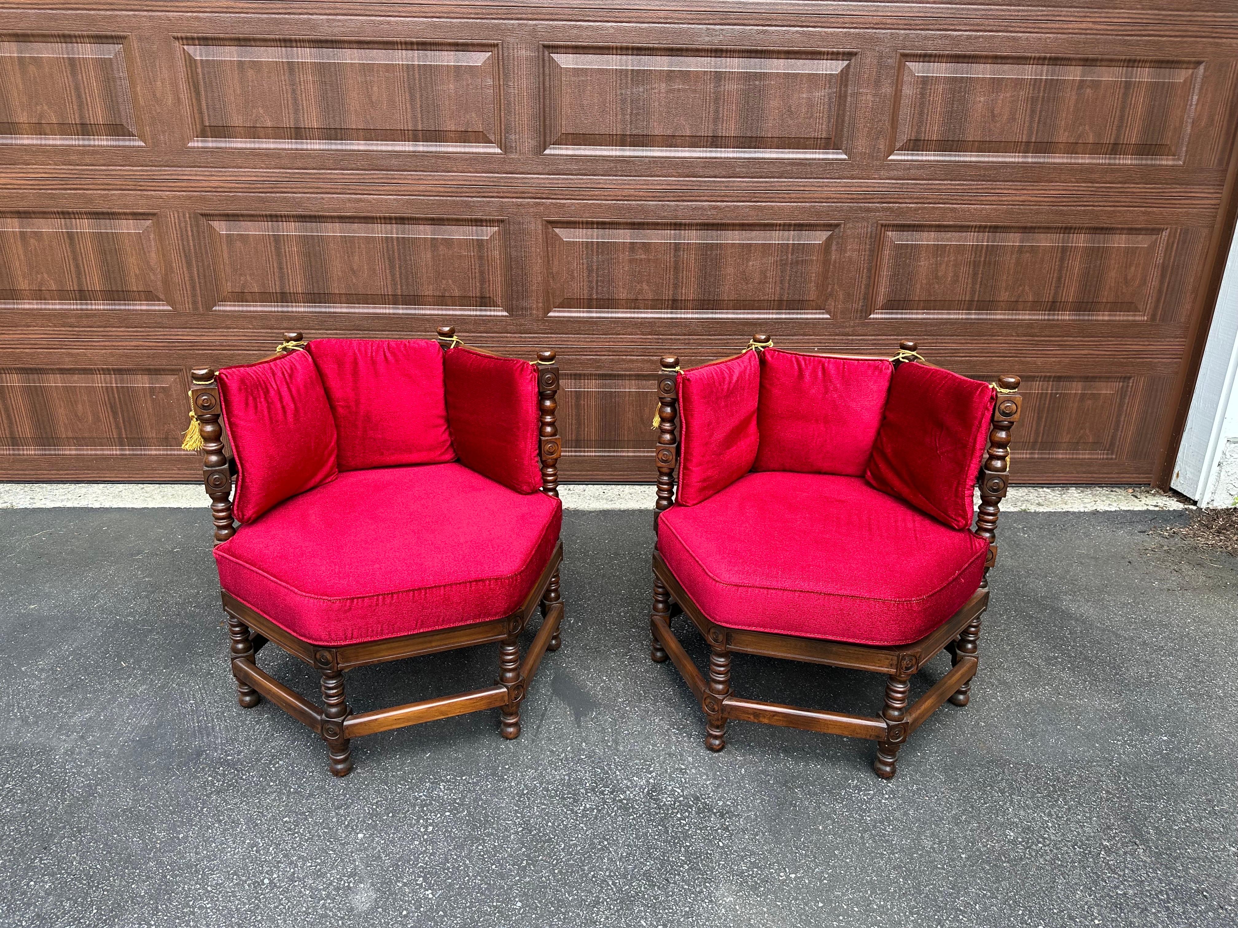 Fabulous pair of statement lounge chairs in red velvet and walnut. Believed to be from the ‘Showpiece’ collection from Lewitte Furniture. Lumber stamp puts these at 1964 at the latest. Mediterranean/Spanish Revival style, these chairs give great
