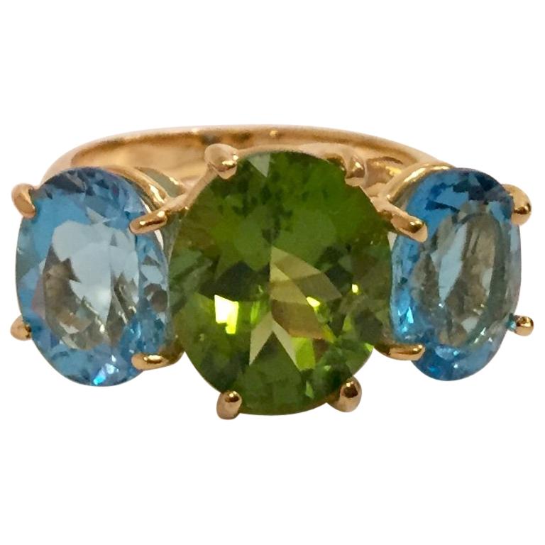 Medium 18 Karat Yellow Gold Gum Drop Ring with Peridot and Blue Topaz For Sale