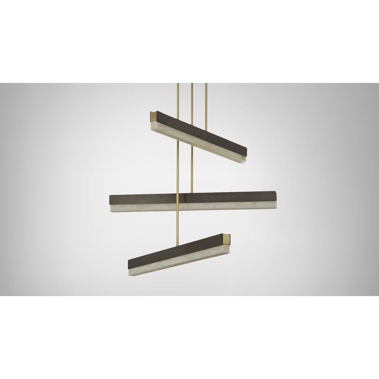 Medium Artés collective lamp by CTO Lighting.
Materials: bronze with satin brass details and honed alabaster.
Dimensions: 90 x H, specified height needed cm.

All our lamps can be wired according to each country. If sold to the USA it will be wired