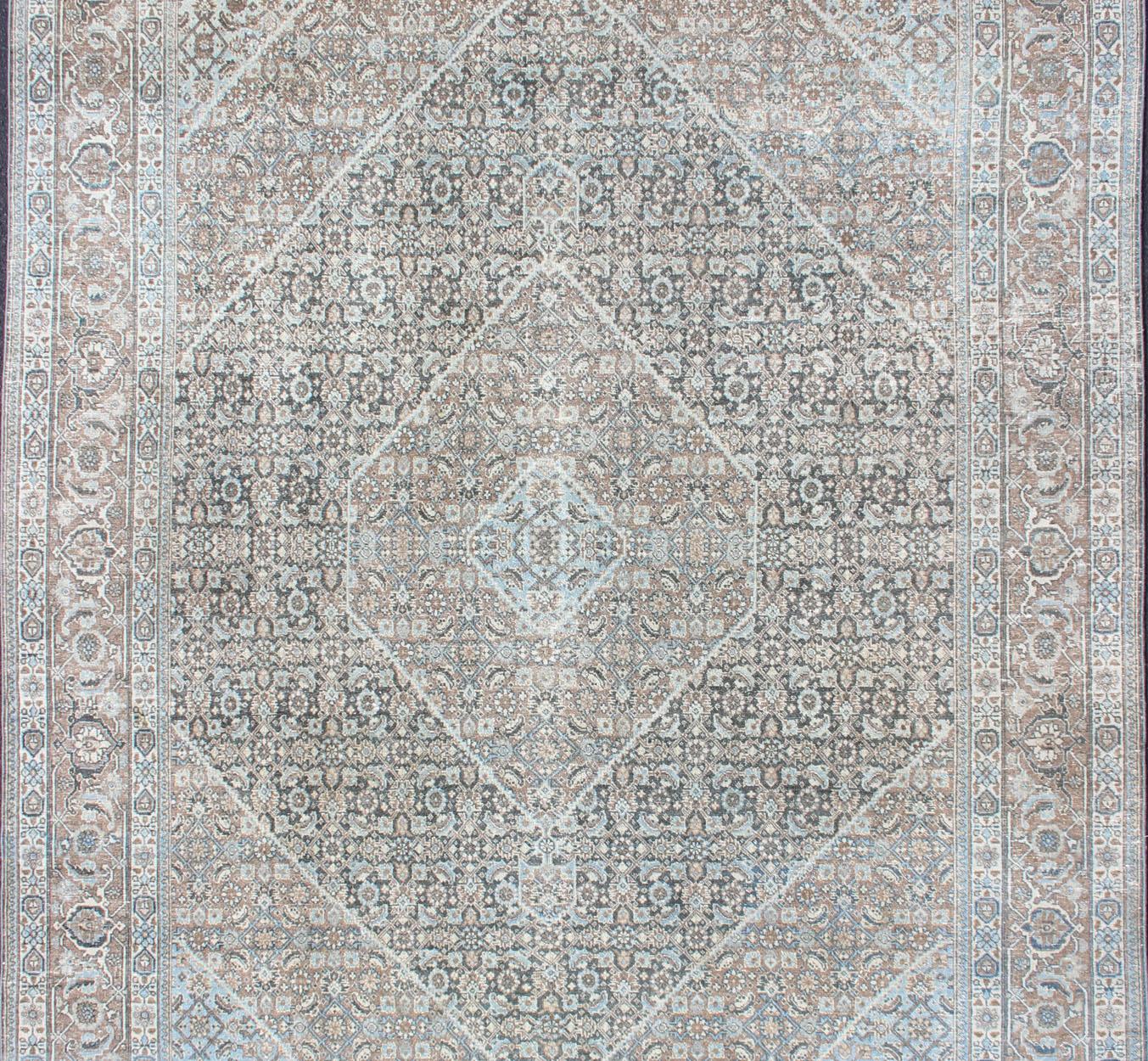 Tan background Persian Tabriz rug with free flowing floral design, rug R20-0603, country of origin / type: Iran / Tabriz, circa 1930.

This magnificent 20th century Persian Tabriz rug bears a beautiful, all-over sub-geometric floral design paired