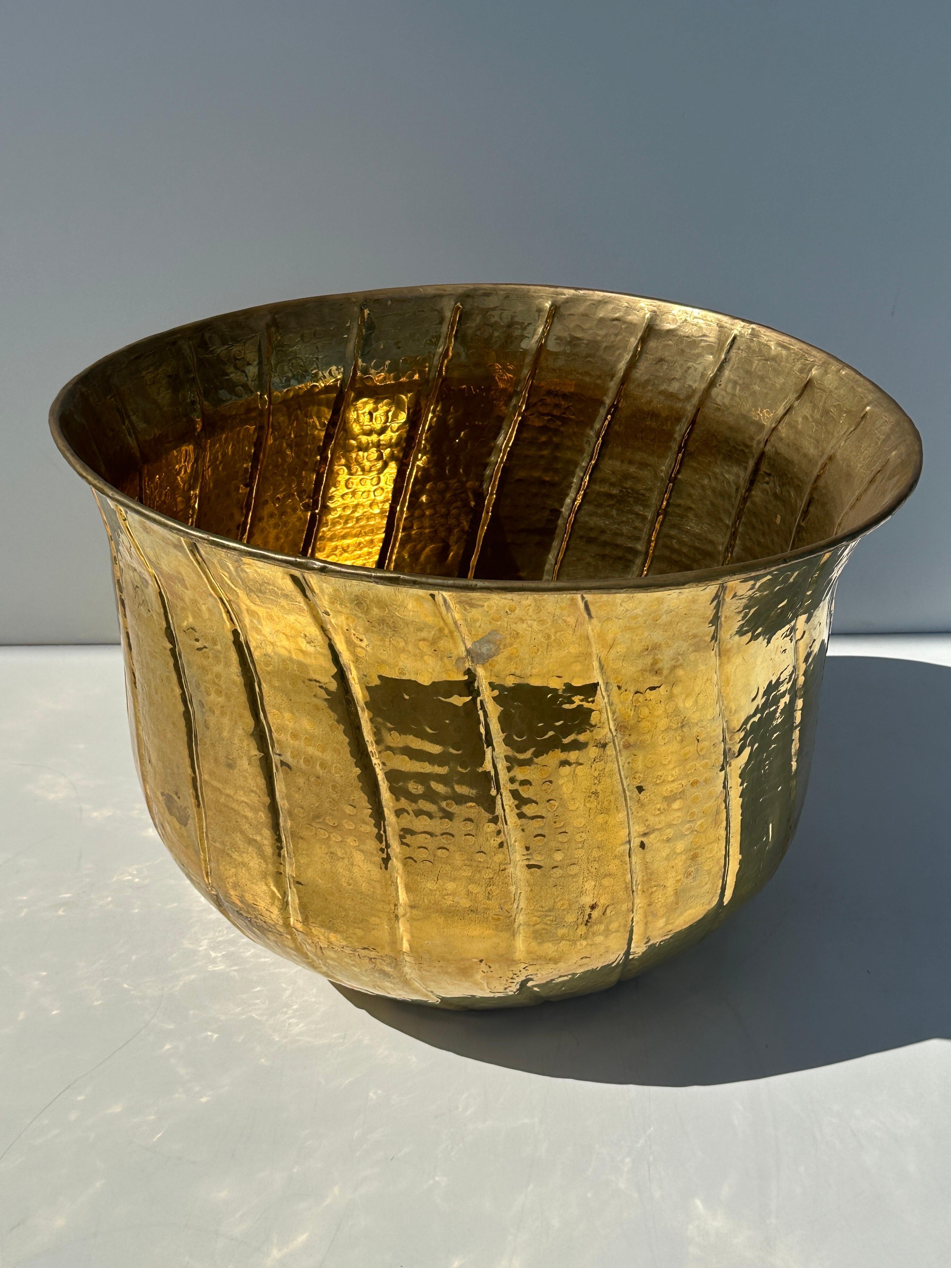 Medium hand hammered brass planter. We also have matching large and extra large planters available shown in last photo.
