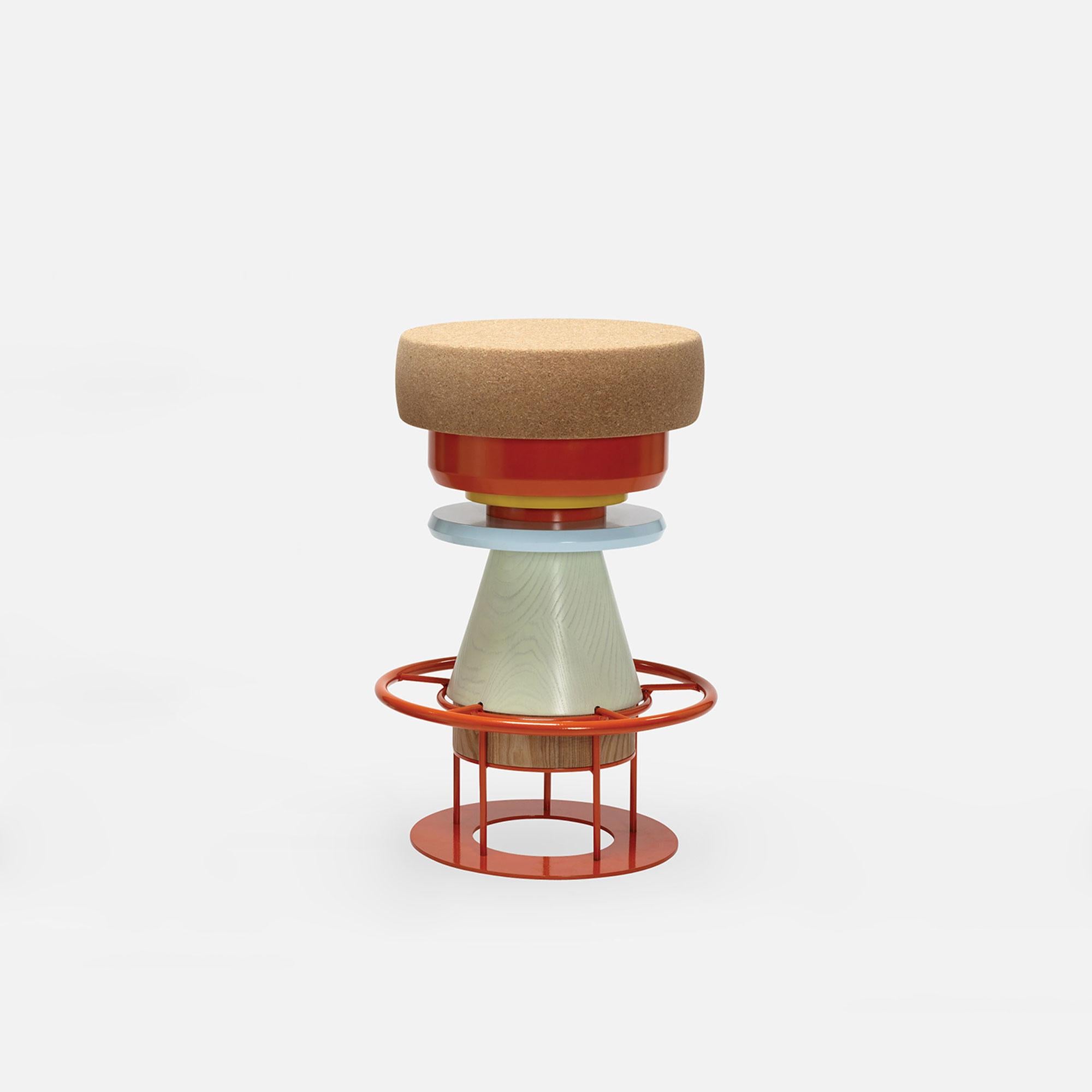 Medium Colorful tembo stool - Note Design Studio
Dimensions: D 36 x H 64 cm
Materials: Lacquered steel structure, solid wood (beech) and lacquered MDF, natural cork base.
Available in black and 3 sizes: H46, H64, H76 cm.

Tembo is a stool made
