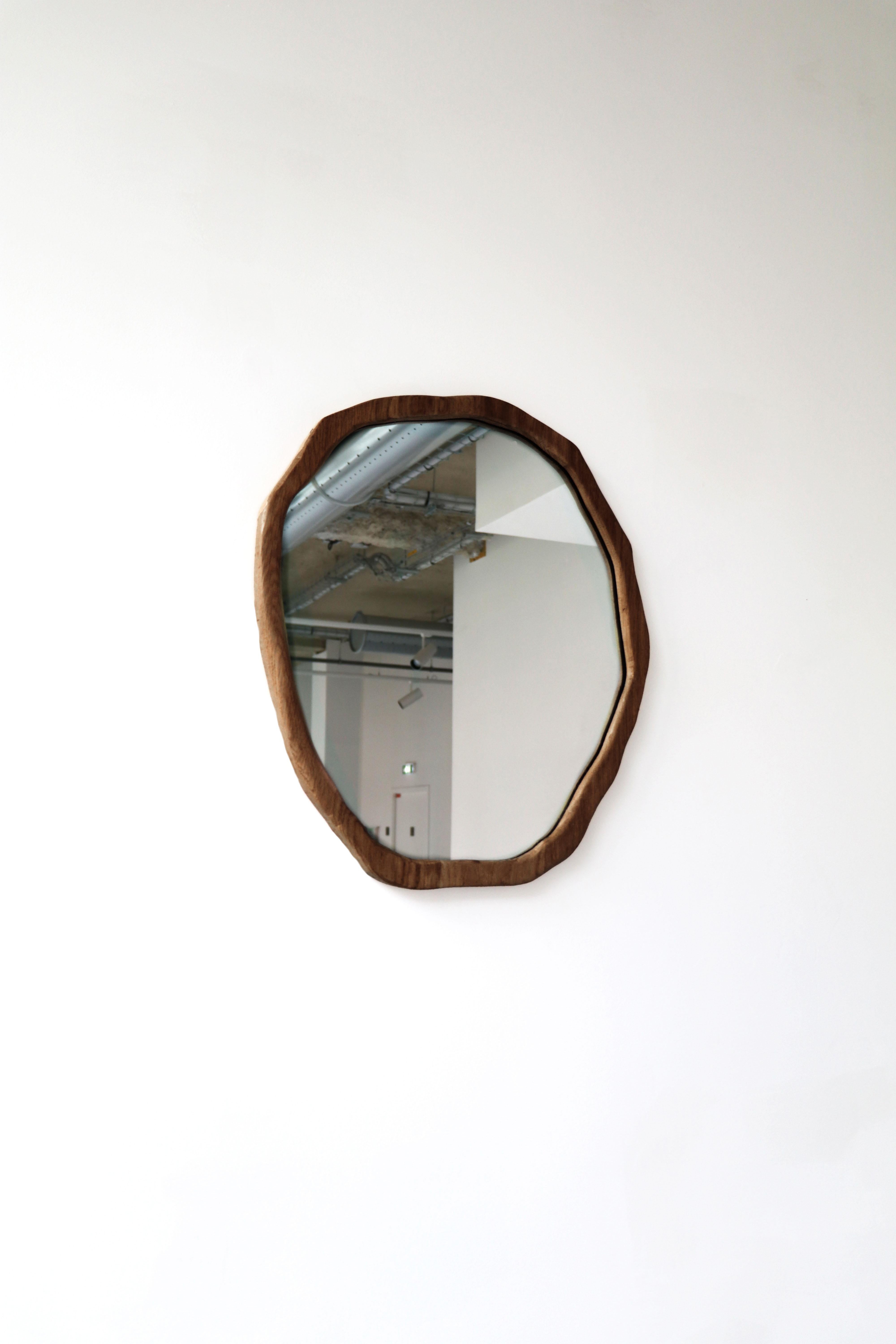 Medium Dark Varnish Ondulation mirror by Alice Lahana Studio
One of a kind.
Dimensions: Ø 50 x H 60 cm.
Materials: Dark Oak.
Available finishes: Dark and light varnish.

Every mirror is unique. The shape slightly varies from edition to