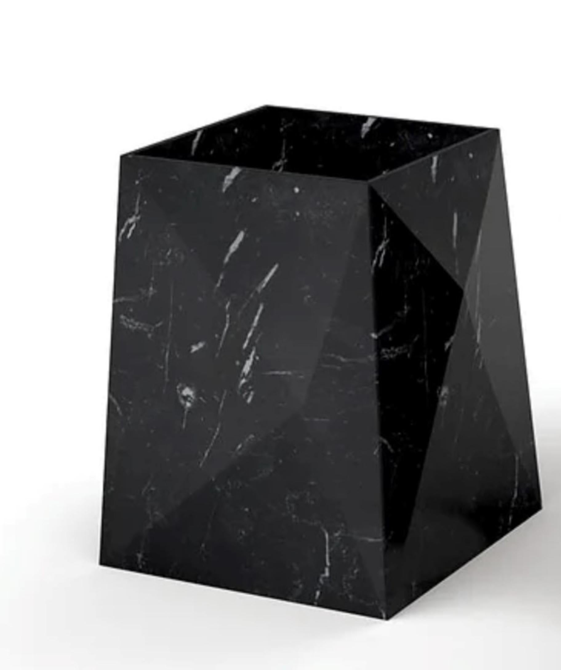 Medium Entity Punta washbasin by Marmi Serafini
Materials: Nero Marquinia marble.
Dimensions: D 50 x W 50 x H 50 cm
Available in other marbles and colors.
Tap not included.

Bold and striking lines that draw immediate attention. Slightly