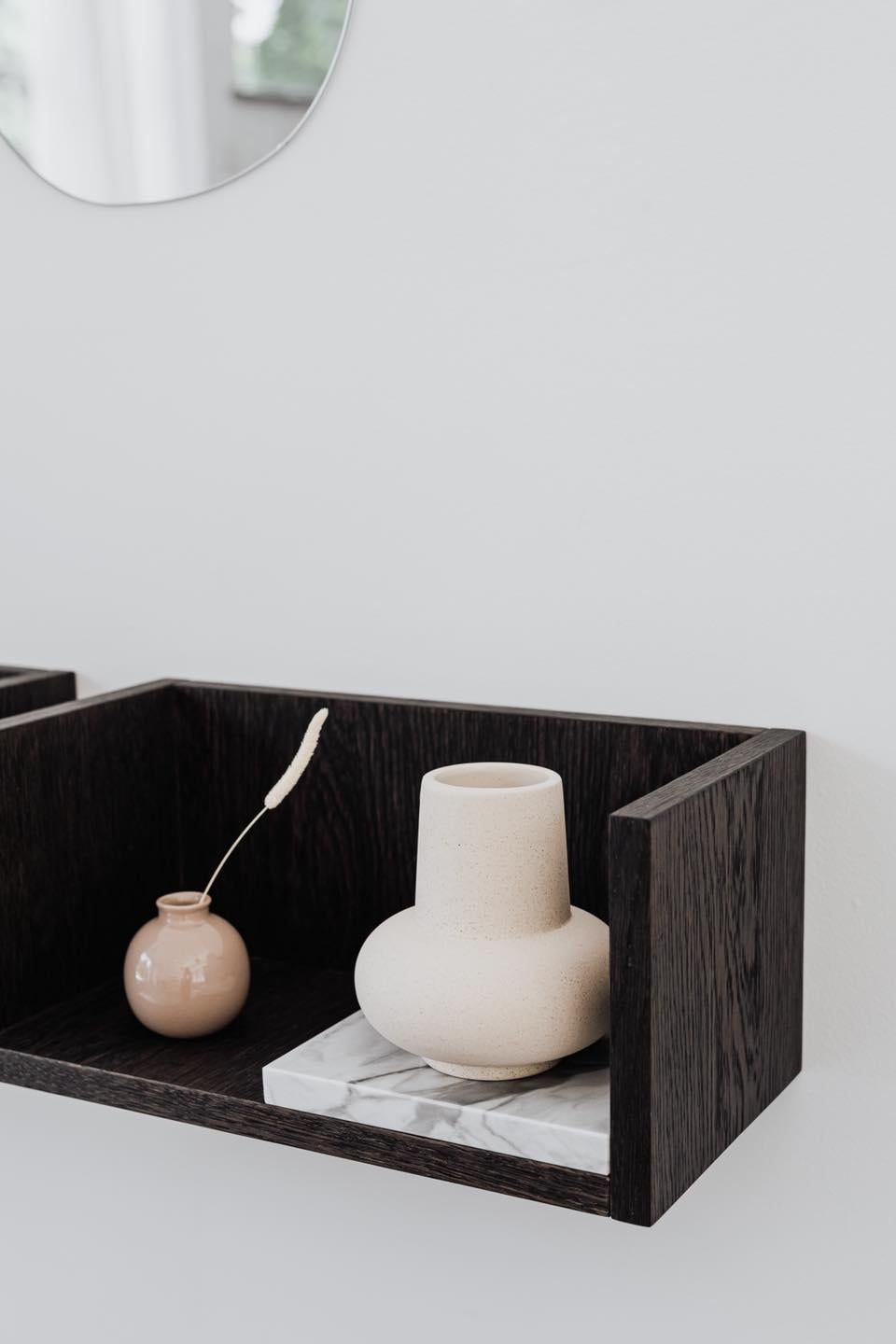 FORST SHELF is a minimalist wall shelf. The perfect spot for a book, candle or vase – all the small items you use every day or your favourite memorabilia. Every shelf has a marble tray to highlight whatever you decide to place on it. Since you can