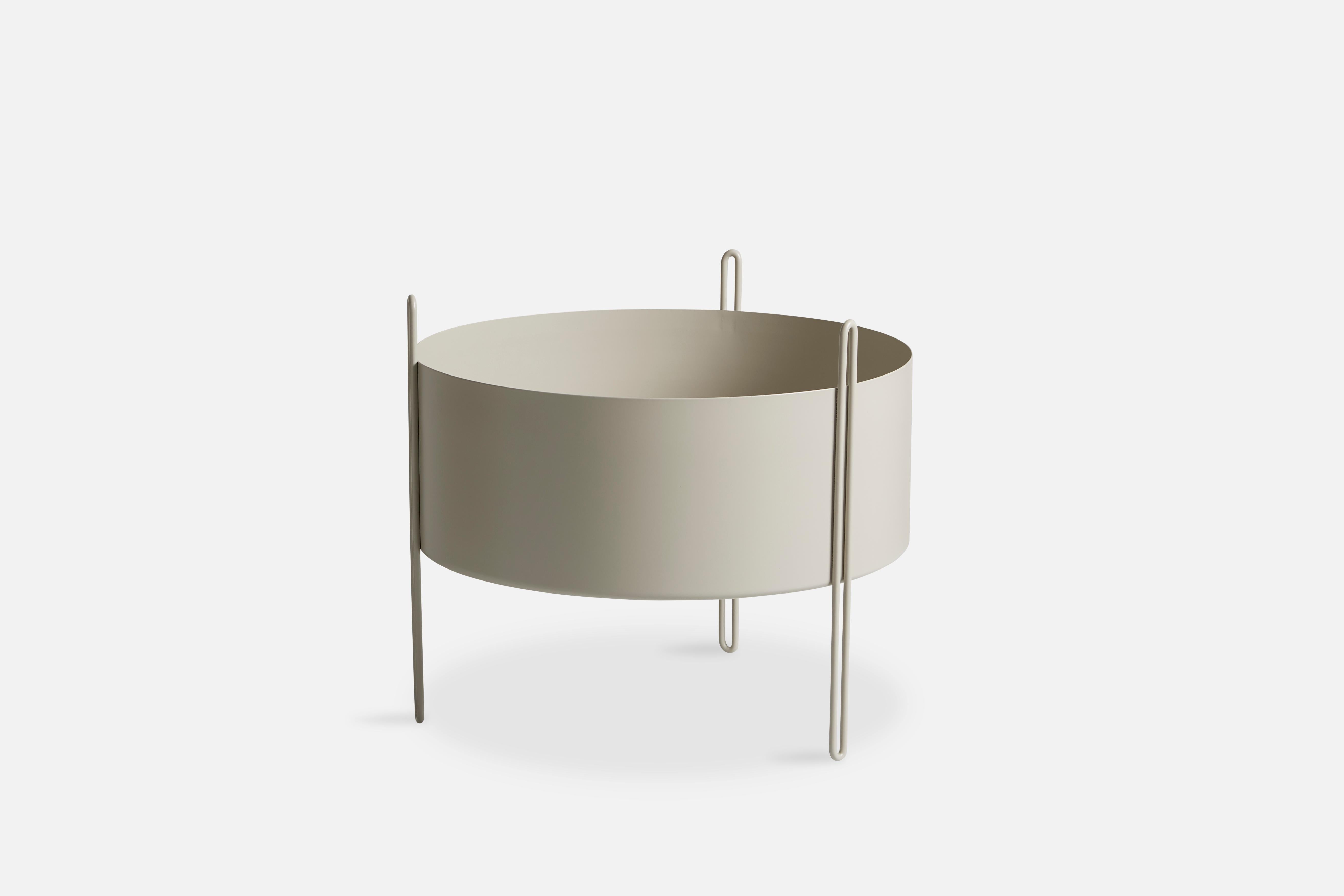 Medium Grey Pidestall planter by Emilie Stahl Carlsen
Materials: Metal.
Dimensions: D 40 x H 35 cm
Available in grey, taupe or black and in 3 sizes: D 15 x H 15, D 40 x H 35, D 40 x H 55 cm.

Emilie Stahl Carlsen is a Nor wegian designer who