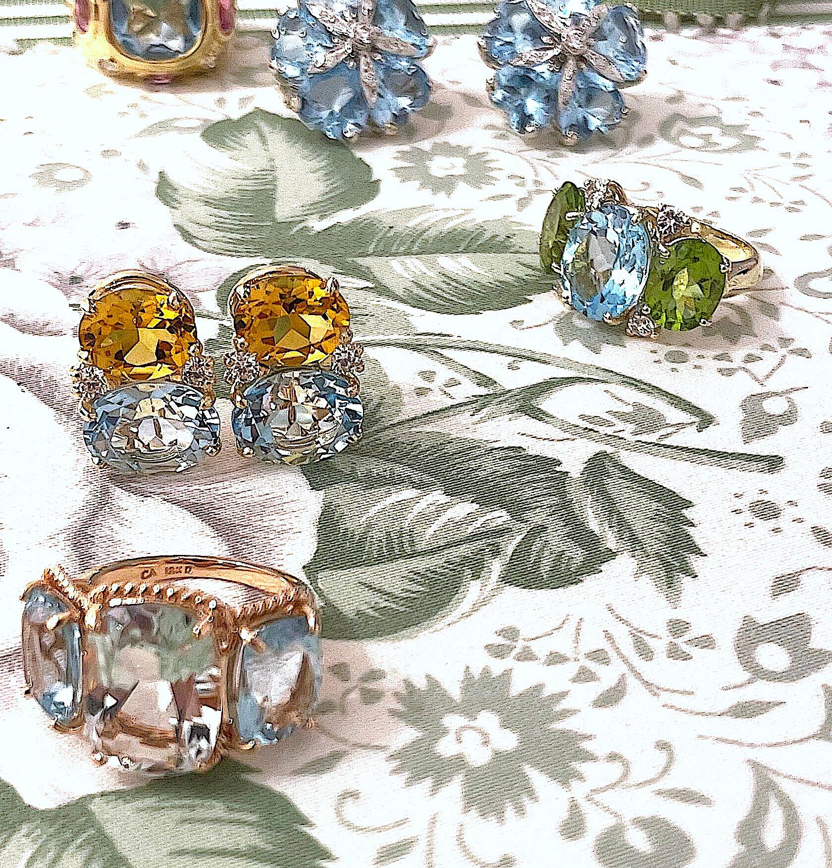 Medium 18kt White gold GUM DROP™ earrings with Citrine (approximately 2.5 cts each), Blue Topaz (approximately 5 cts each), and 4 diamonds weighing ~0.40 cts.

They can be made in ANY color stone combination that you would like!
Please contact us