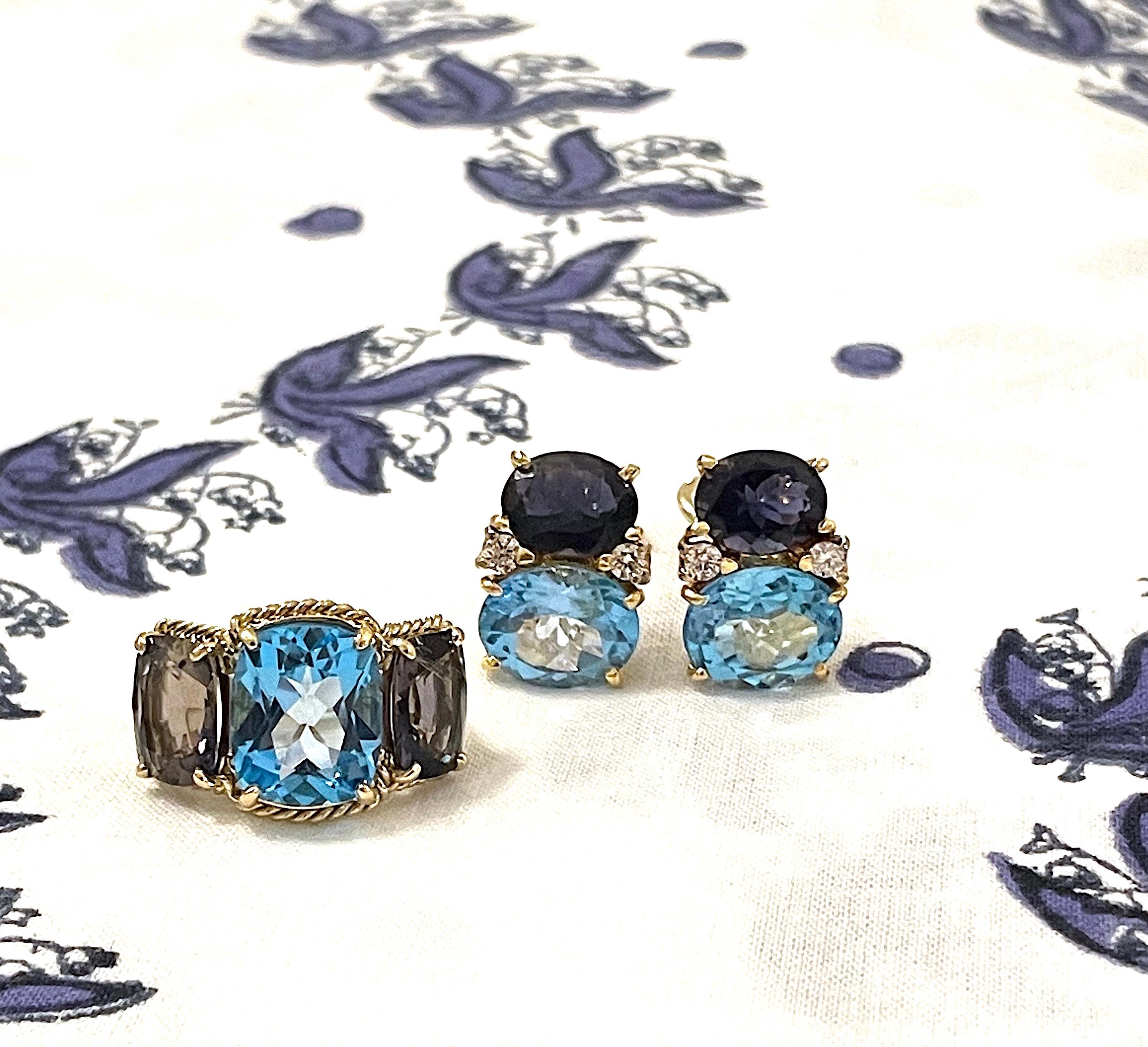 Medium 18kt Yellow Gold GUM DROP™ earrings with Iolite (approximately 2.5 cts each), Blue Topaz (approximately 5 cts each), and 4 diamonds weighing ~0.40 cts.

They can be made in ANY color stone combination that you would like!
Please contact us