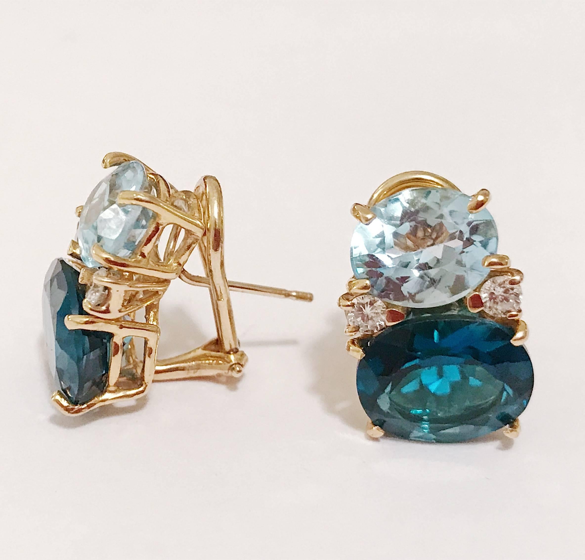 Medium 18kt yellow gold GUM DROP™ earrings with faceted Pale Blue Topaz (approximately 2.5 cts each), faceted London Blue Topaz (approximately 5 cts each), and 4 diamonds weighing ~0.40 cts. 

Specifications: Height: 3/4