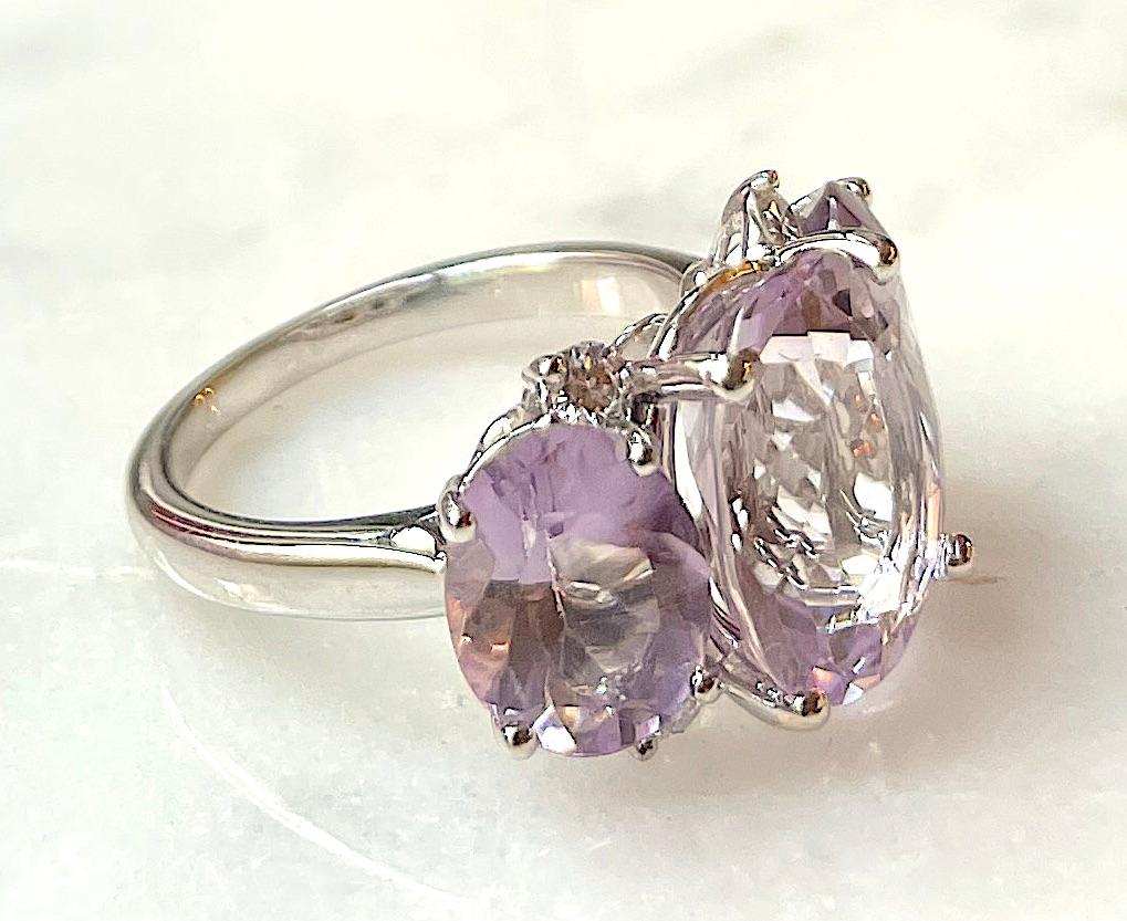Medium 18kt White Gold GUM DROP™ Ring with Morganite (approximately 5 cts), pale Rose de France Amethyst (approximately 4 cts each), and four diamonds weighing approximately 0.48 cts.

Specifications: Length: 7/8