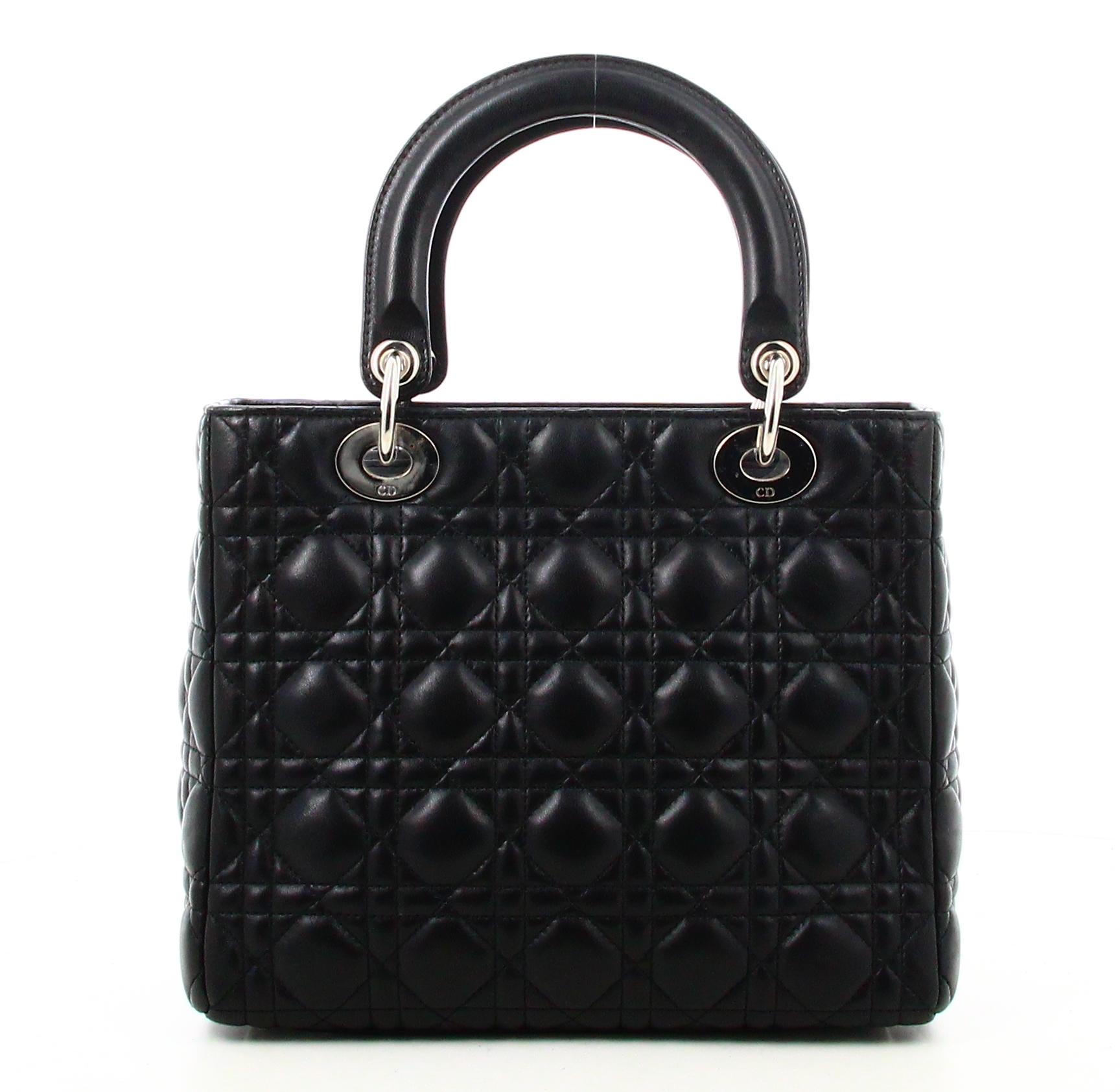 Medium Handbag Lambskin Cannage Lady Dior

- Very good condition. Shows very slight signs of wear over time. 
- Lady Dior Handbag 
- Black leather 
- Two black leather handles 
- Clasp: silver zipper 
- Inside: black leather plus zipped pocket