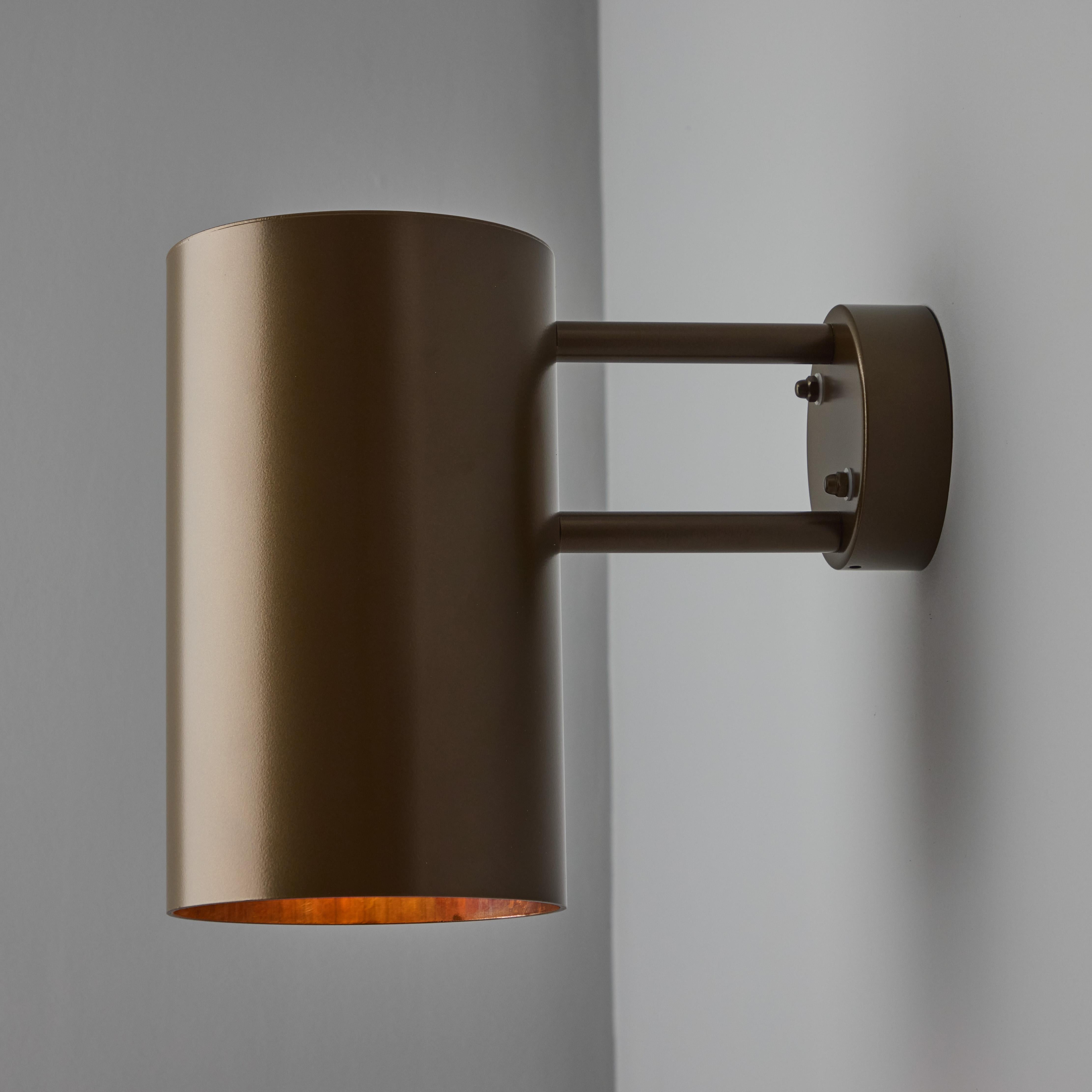 Mittelgroße Hans-Agne Jakobsson C627/110 Wandleuchter 'Rulle', braun lackiert (Metall) im Angebot