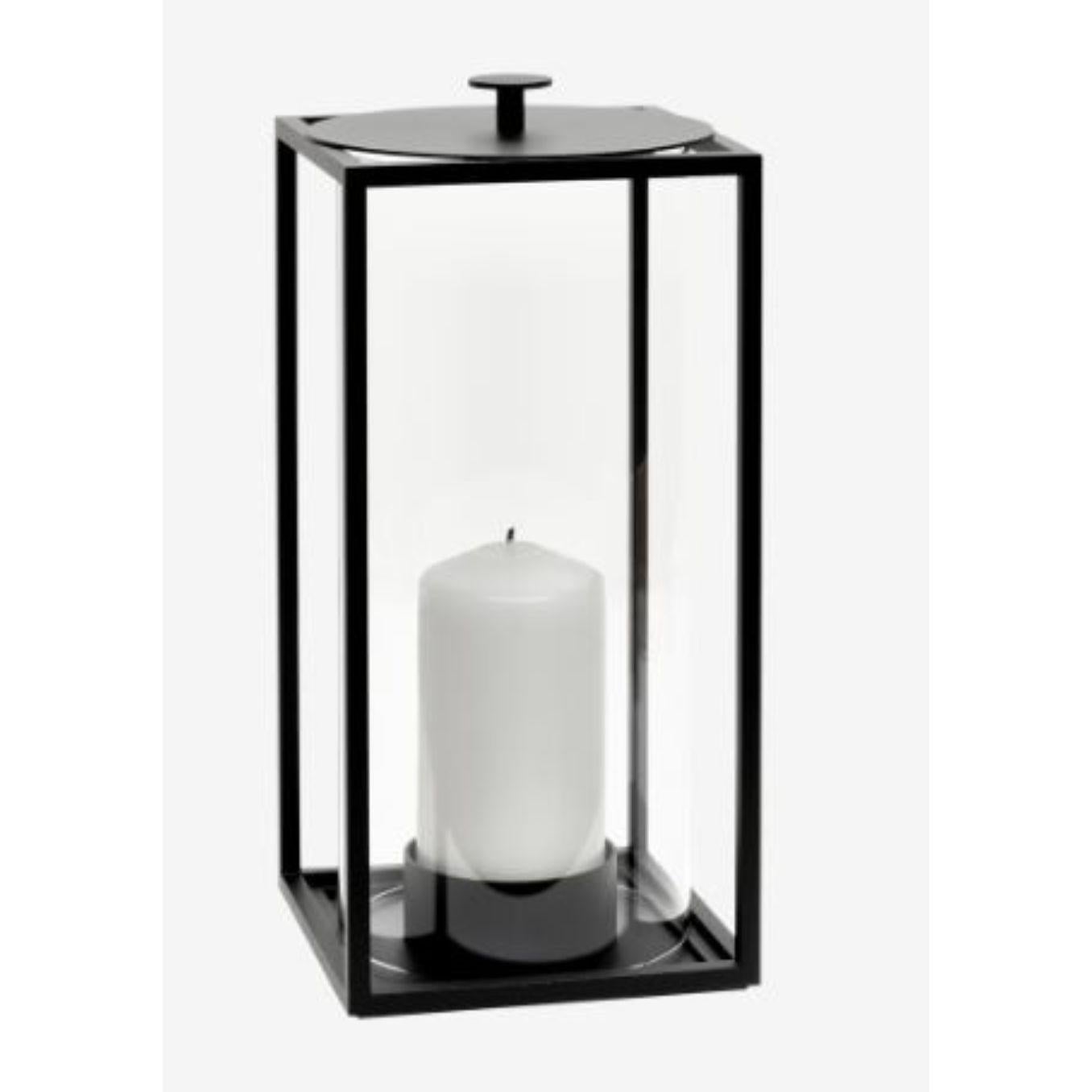 Medium Light’In lantern by Lassen
Dimensions: d 10 x w 12 x h 24 cm 
Materials: Metal 
Also available in different dimensions.
Weight: 1.75 Kg

With a sharp sense of contemporary Functionalist style, Mogens Lassen designed the iconic Kubus