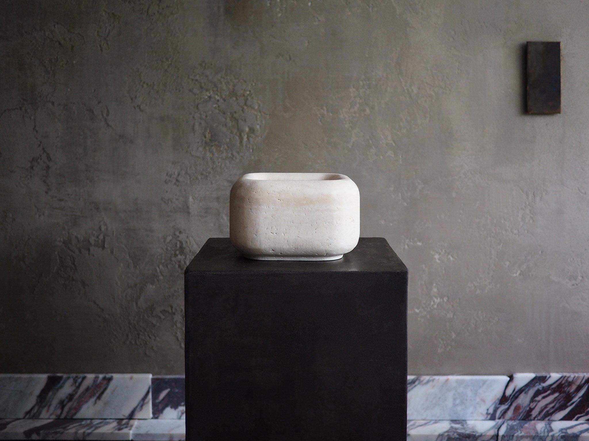 The Medium Marshmallow is literally a, yes.. marshmallow, made of travertine. Carved from solid blocks of natural unfilled travertine, it becomes an object of desire by itself, or as a pair . A sculptural vessel with various uses. Kitchen, bathroom