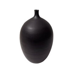 Medium Matte Black Curved Ceramic Bottle Vase with Narrow Neck by Sandi Fellman