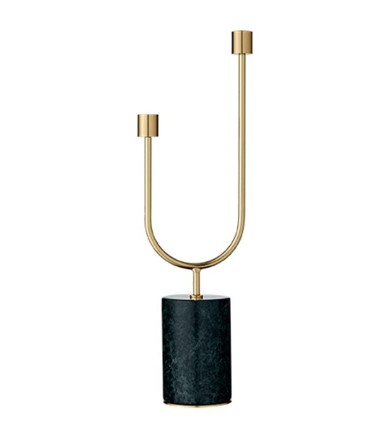 Medium minimalist candleholder 
Dimensions: D 13.5 x W 8 x H 43.5 cm 
Materials: Steel. Marble. 
Also available in sizes small and large. 

With a solid marble base and exquisite brass or black details, the Grasil candleholders provide a unique