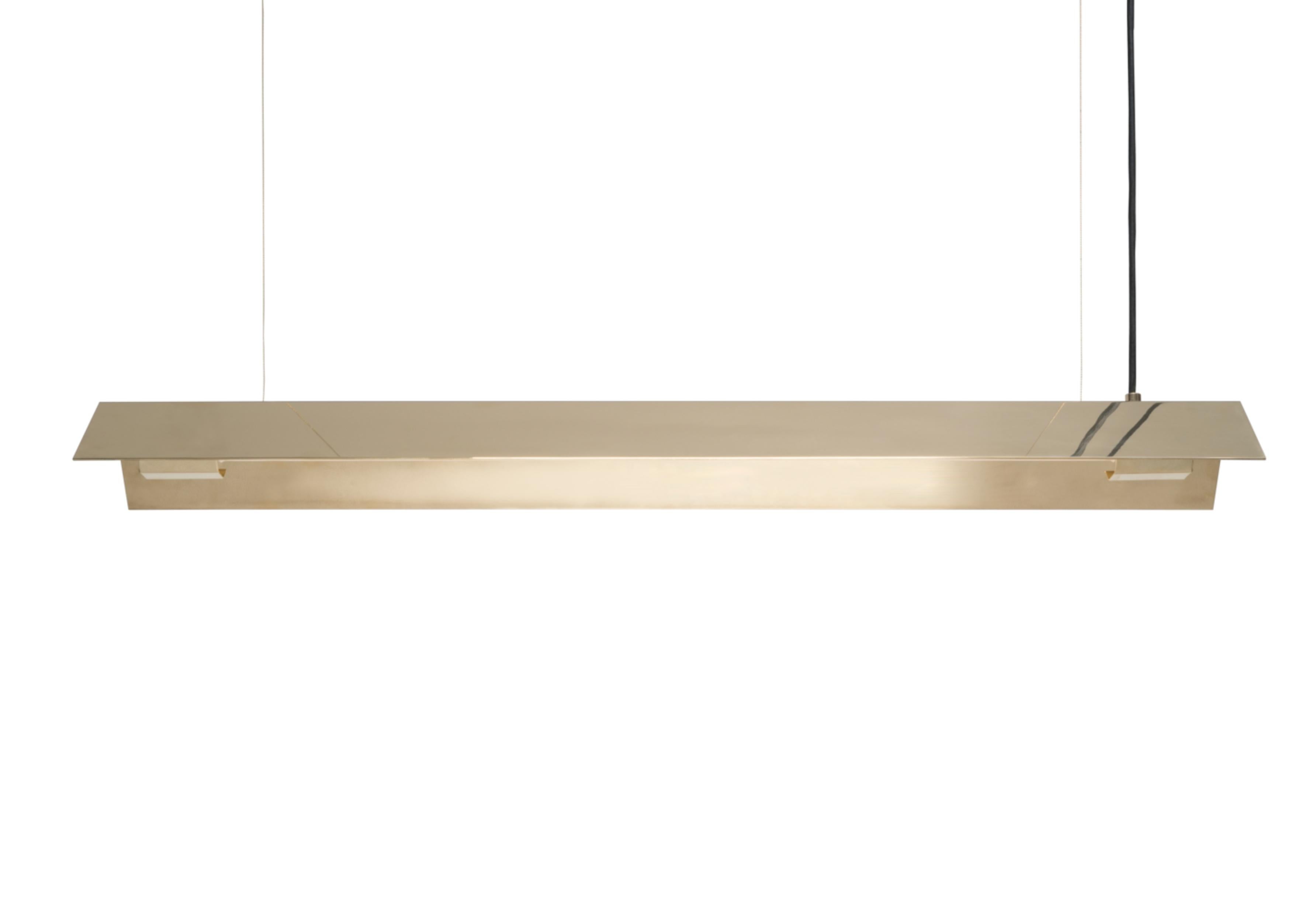 Medium Misalliance solid brass suspended light by Lexavala
Dimensions: D 16 x W 100 x H 8 cm
Materials: Brass.

There are two lenghts of socket covers, extending over the LED. Two short are to be found in Suspended and Surface, and one long in