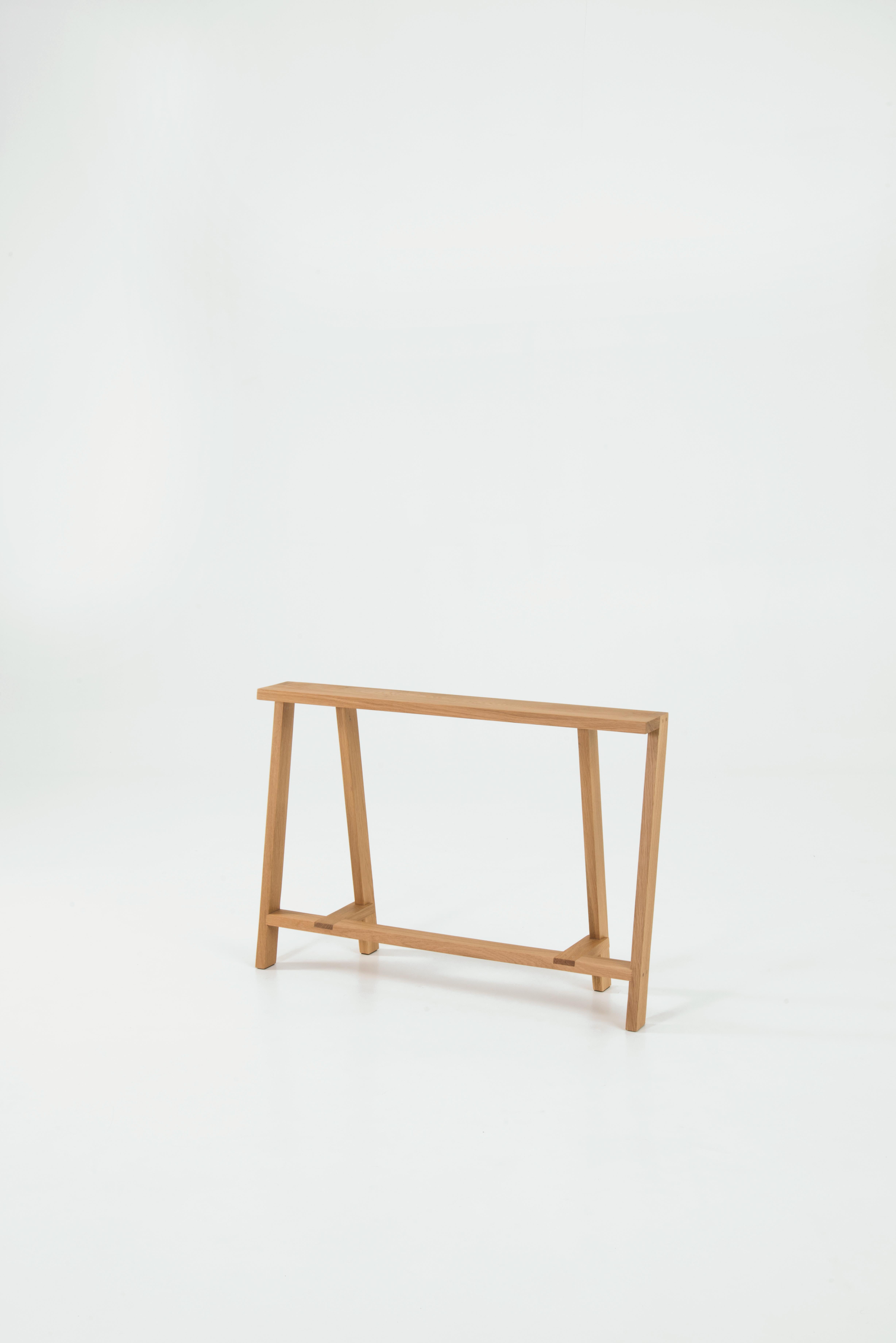 Medium Pausa oak bench by Pierre-Emmanuel Vandeputte
Dimensions: D 27 x W 95 x H 65 cm
Materials: oak wood.
Available in burnt oak version and in 3 sizes.

Pausa is a series of benches; 45cm, 65cm, or 80cm of assembled oak pieces. 
The narrow