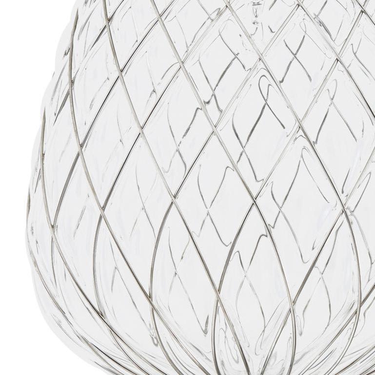 Medium 'Pinecone' suspension lamp in transparent glass & chrome for Fontana Arte. Designed by Paola Navone, the Pinecone comes in both a suspension and table lamp. The diffuser is manufactured using the ancient caged blown glass technique: the glass