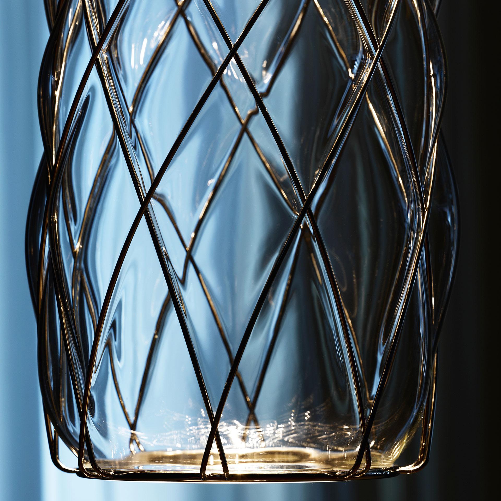 Medium 'Pinecone' suspension lamp in transparent glass & chrome for Fontana Arte. Designed by Paola Navone, the Pinecone comes in both a suspension and table lamp. The diffuser is manufactured using the ancient caged blown glass technique: the glass