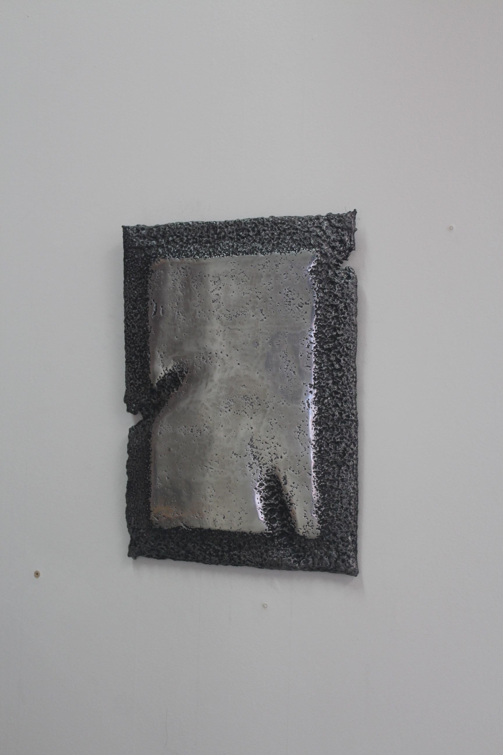 Medium Rectangle Mirror by Saturday Yard Work
Dimensions: W 40 x D 30 x H 2.5 cm
Materials: Aluminium.
Finish: Semi-reflective polished face / blackened texture. 

SATURDAY YARD WORK by Nathan Martin is a Kaurna/Adelaide based practice that aims to