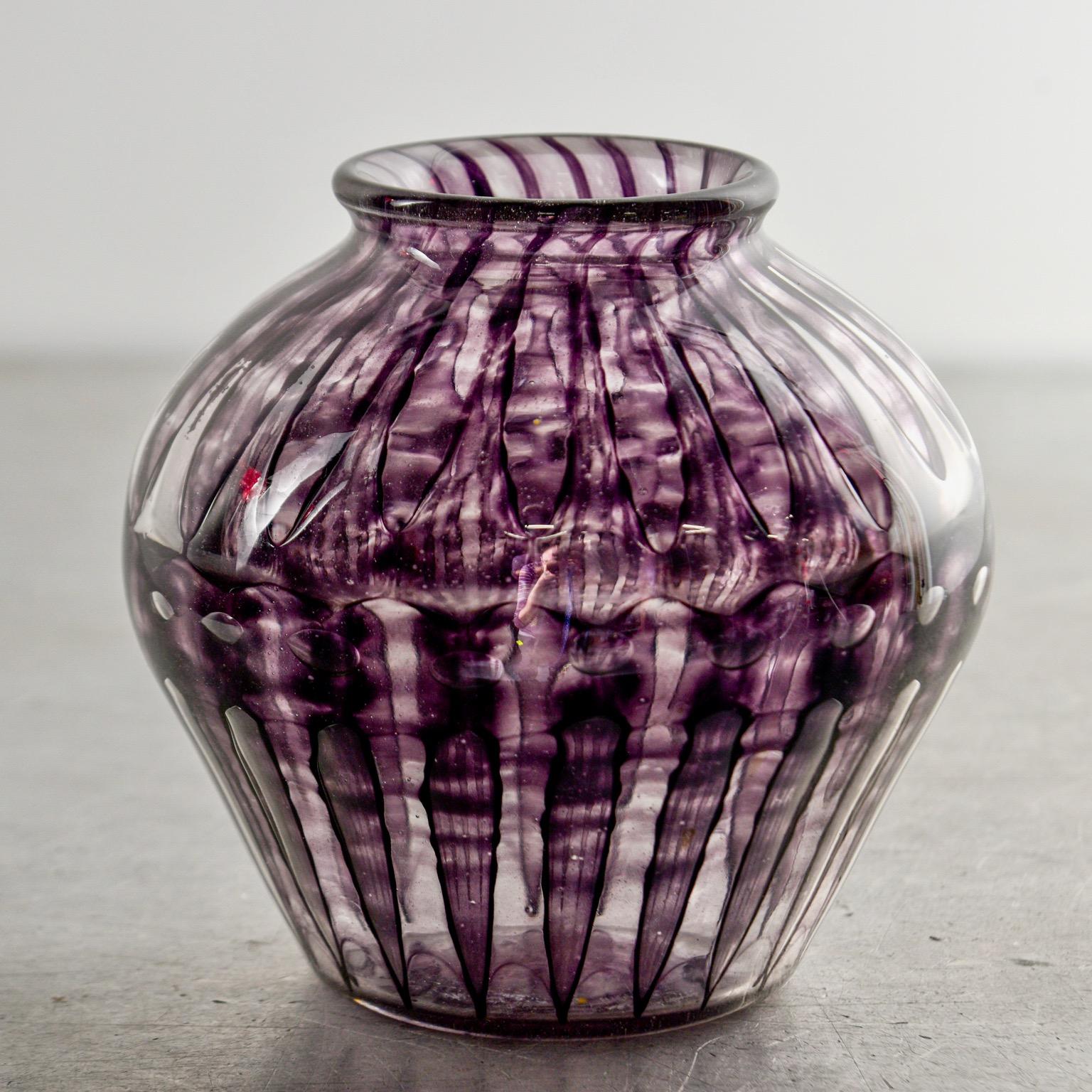 Medium sized art glass vase in mottled aubergine with etched Verlys signature on underside of base, circa 1940.