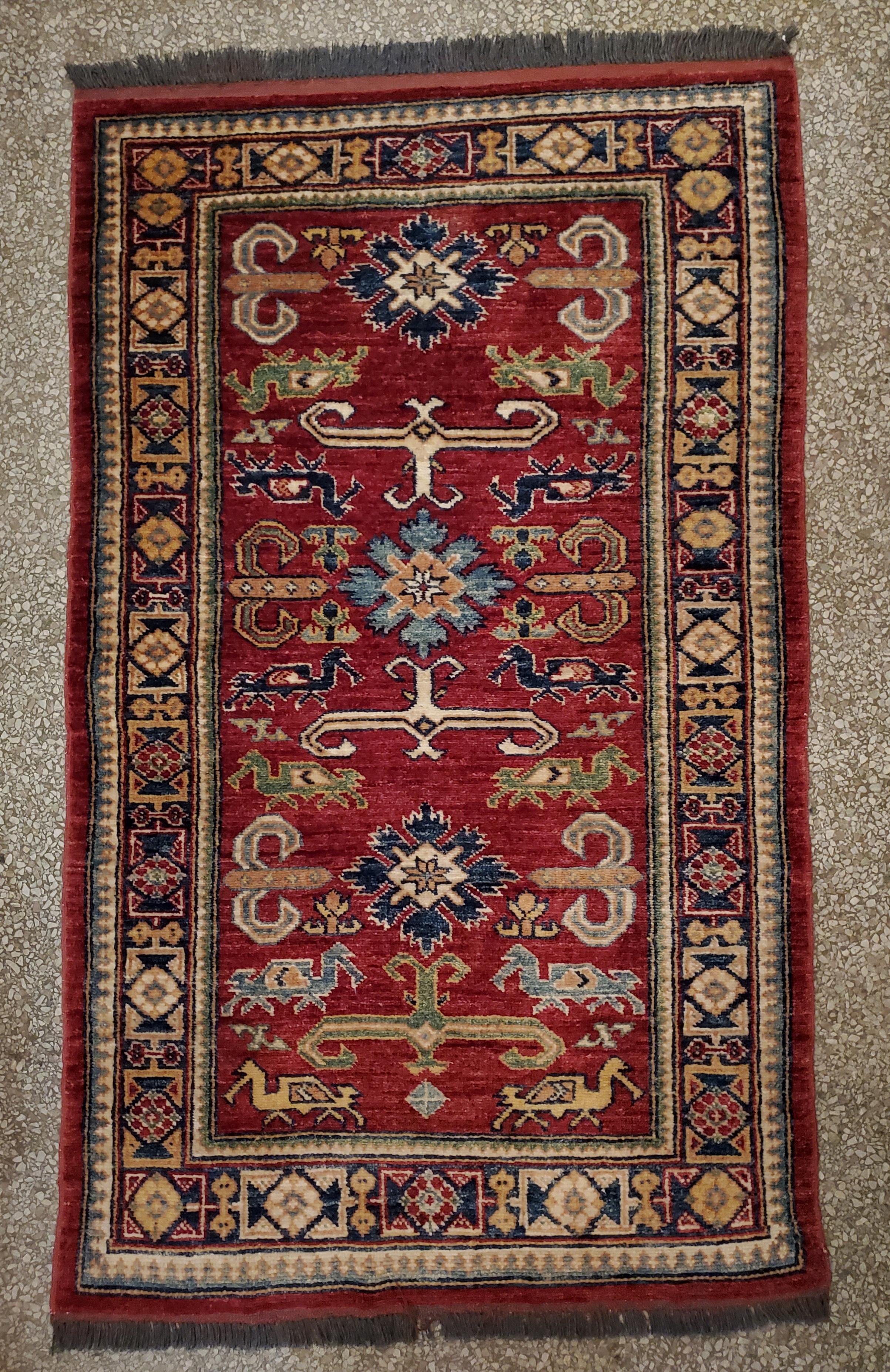 We carry some of the best Afghan bedside rugs, and if you are willing to give your room a colorful new look with one of our stunning carpets, we are here to help. This one measures approximately 51
