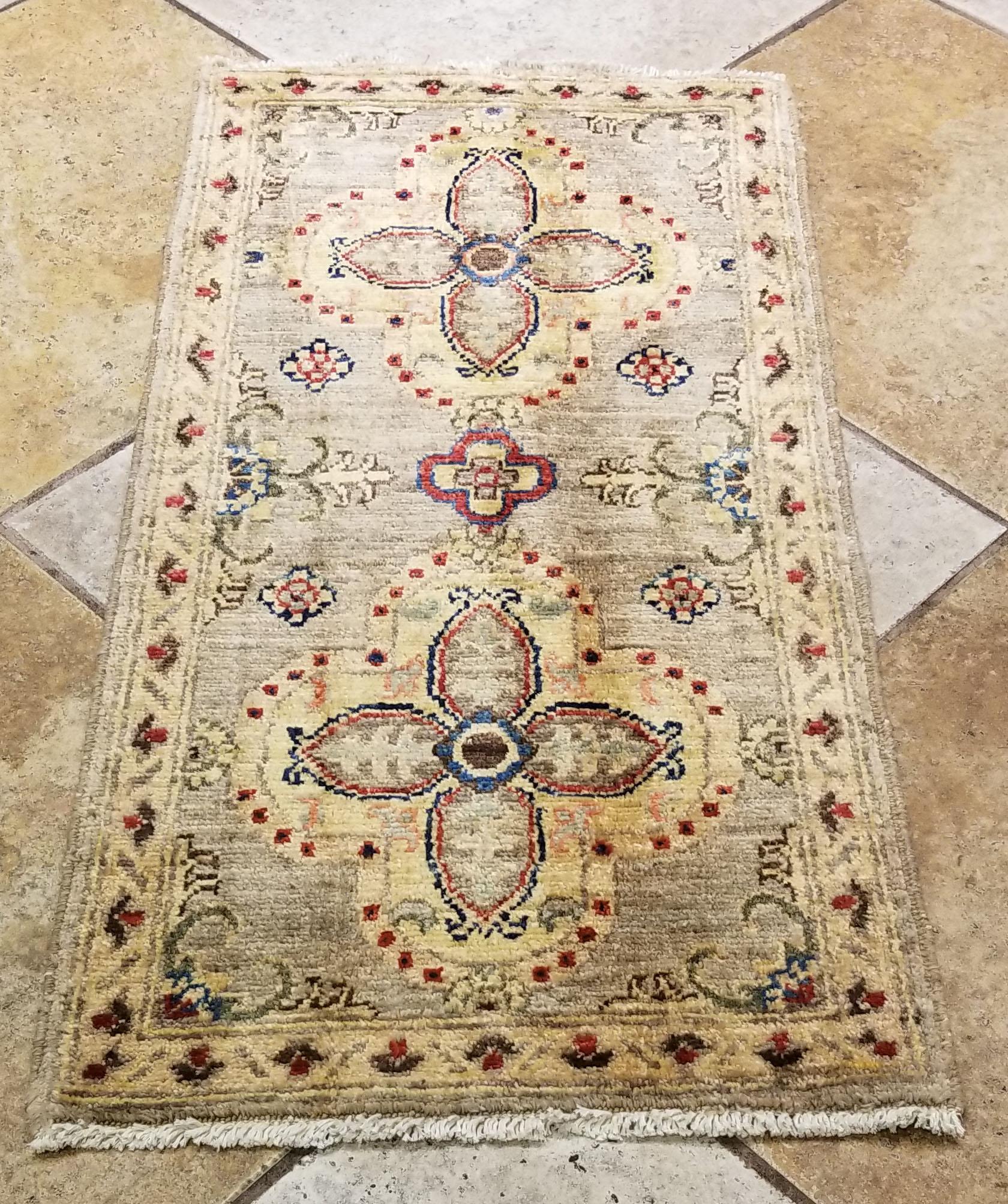 We carry some of the best Afghan bedside rugs, and if you are willing to give your bedroom a colorful new looks with one of our stunning carpets, we are here to help. This one measures approximately 40