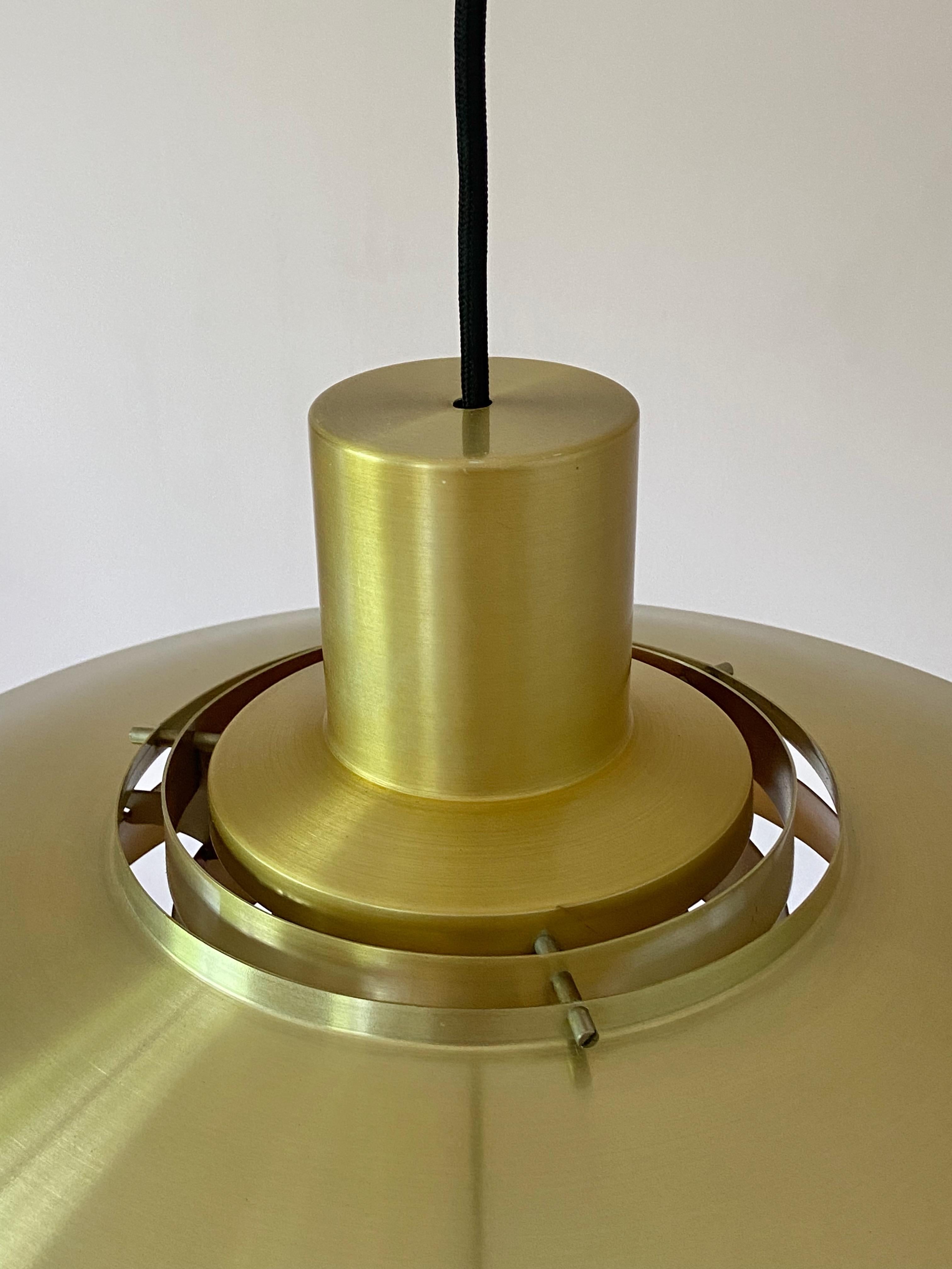 Very nice M Size brass colored Preben Fabricius & Jørgen Kastholm P376 ceiling lamp. Design 1964 and manufactured by Nordisk Solar in Denmark. 
 
This original vintage version is in a good condition without dents, only some small scratches as