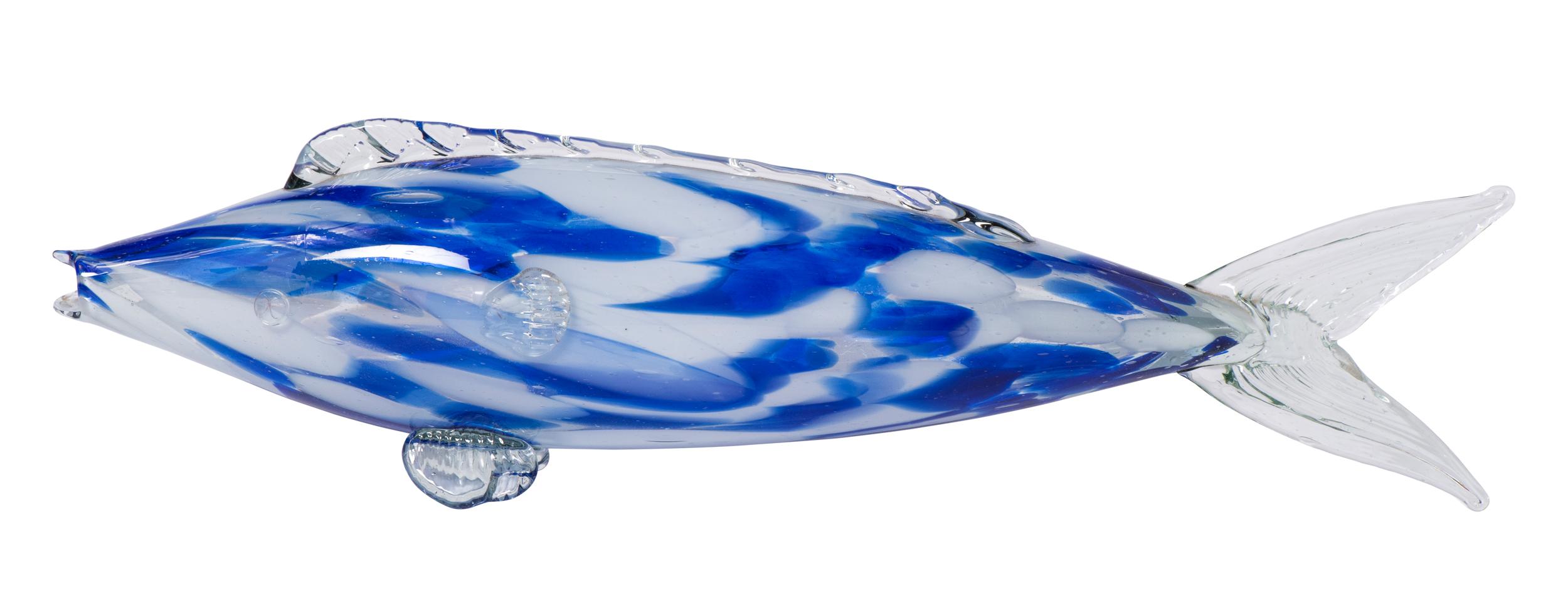 A medium Murano glass fish.
Clear, blue and white glass.
Beautifully blown with moulded fin detail.
Italy, circa 1970
Measures: 38 cm wide x 8 cm deep x 12 cm high.