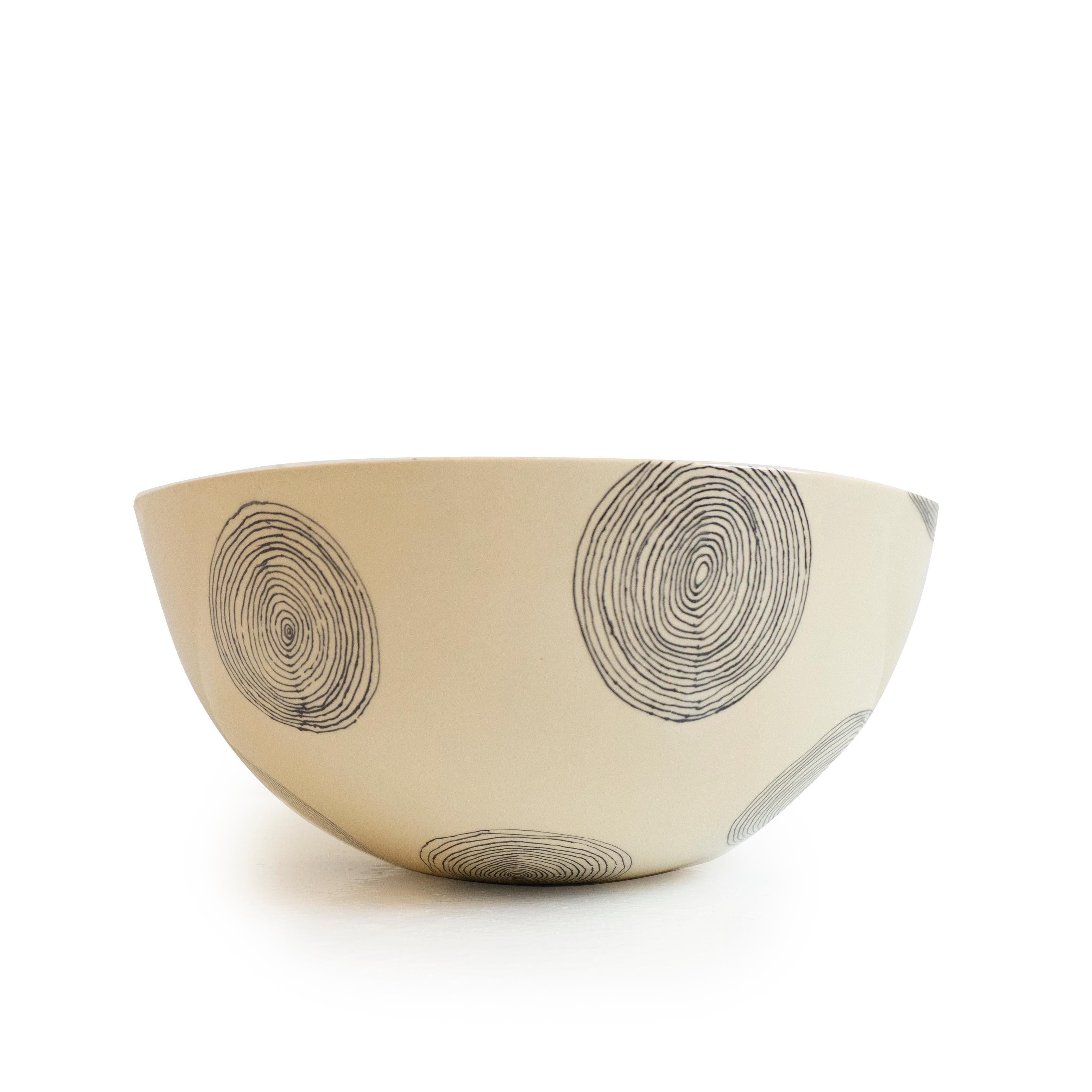 This handcrafted ceramic bowl from Paris is completely handmade. From the hand beating of the clay to the drawn illustration each bowl is meticulously crafted. This bowl is made from natural clay resulting in slightly different hues from one piece