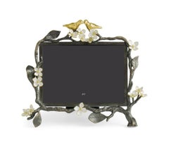 Cadre photo de taille moyenne avec motif d'oiseau en argent, or et métal émaillé