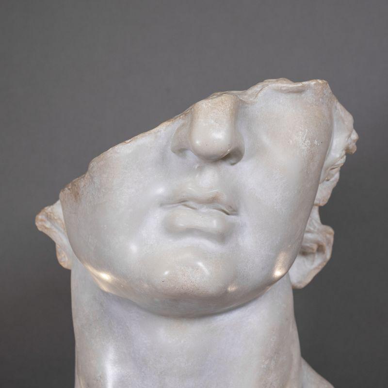 Modern Medium-Sized Resin Sculpture Representing a Fragment of the Sculpture of Apollo. For Sale