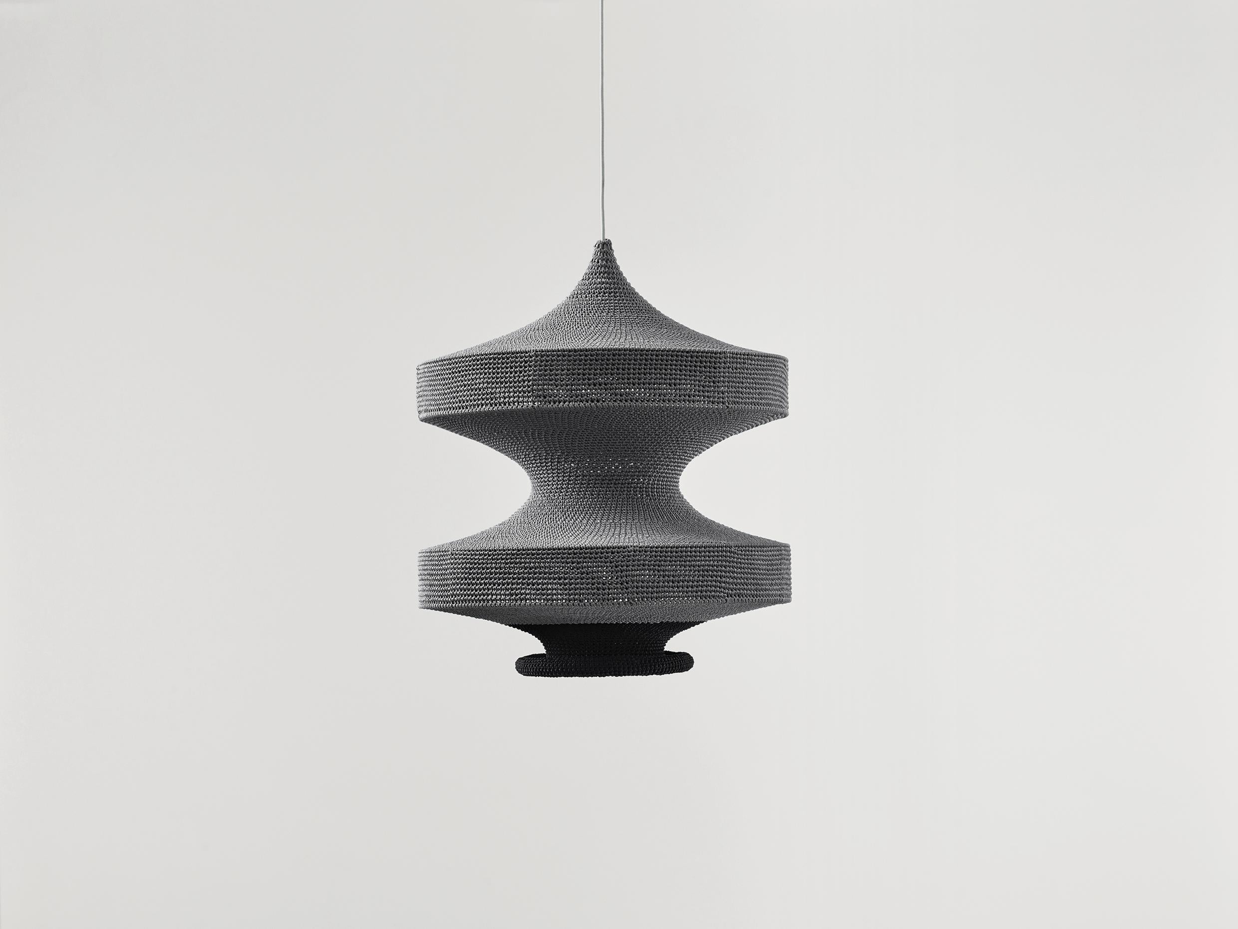Medium Sonne pendant lamp by Naomi Paul
Dimensions: D 50 x H 60 cm.
Materials: metal frame, Egyptian cotton cord.
Color: Down Grey with Black lower.
Available in other colors and in 3 sizes: D32, D50, D60 cm.
Available in plain or two tone