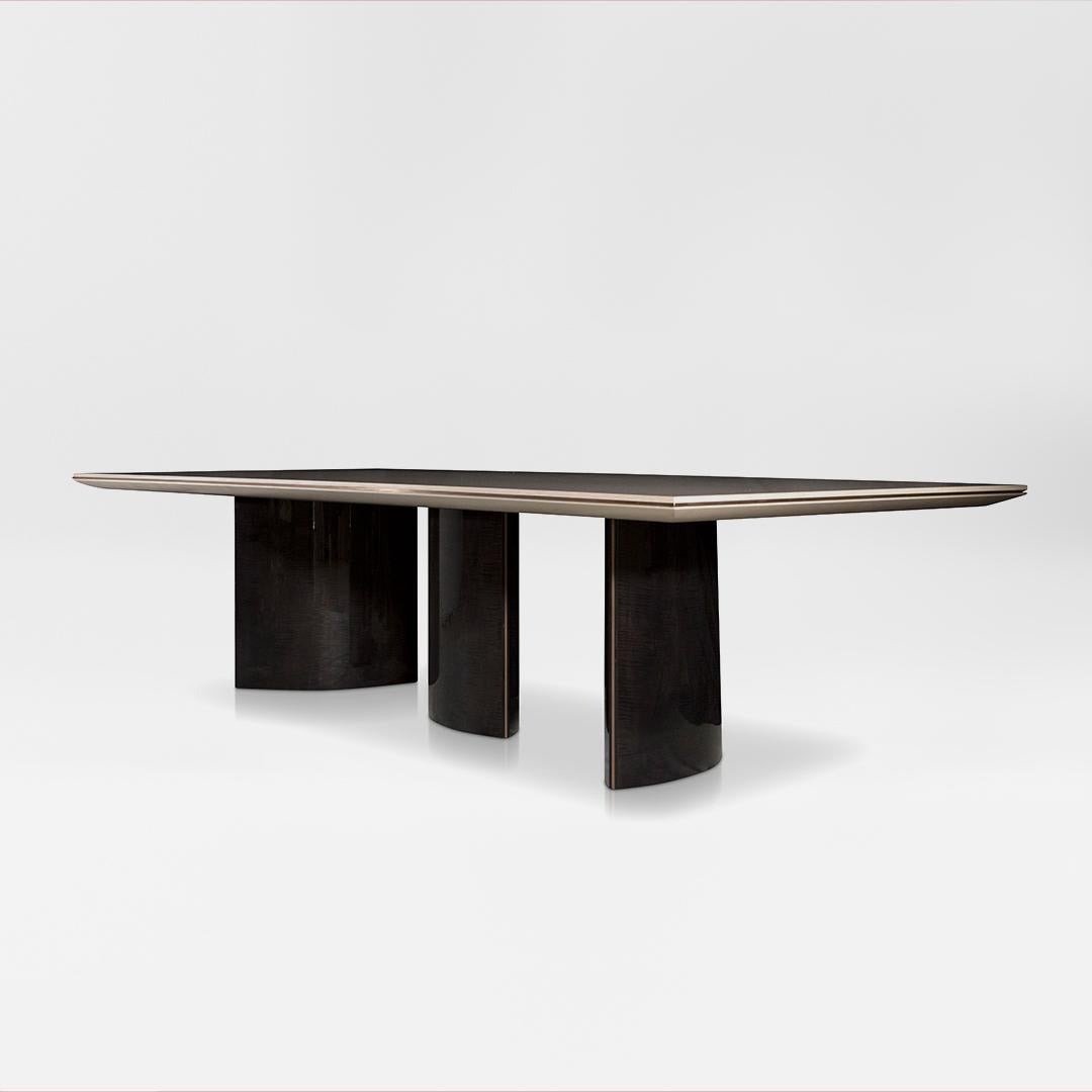 Inspired by Mies Van der Rohe's iconic Barcelona Pavillion, the Rivington Dining Table is a striking ode to European 20th-century design through its bold use of asymmetric shapes and contrasting materials. 

The smooth curvature of the pedestals