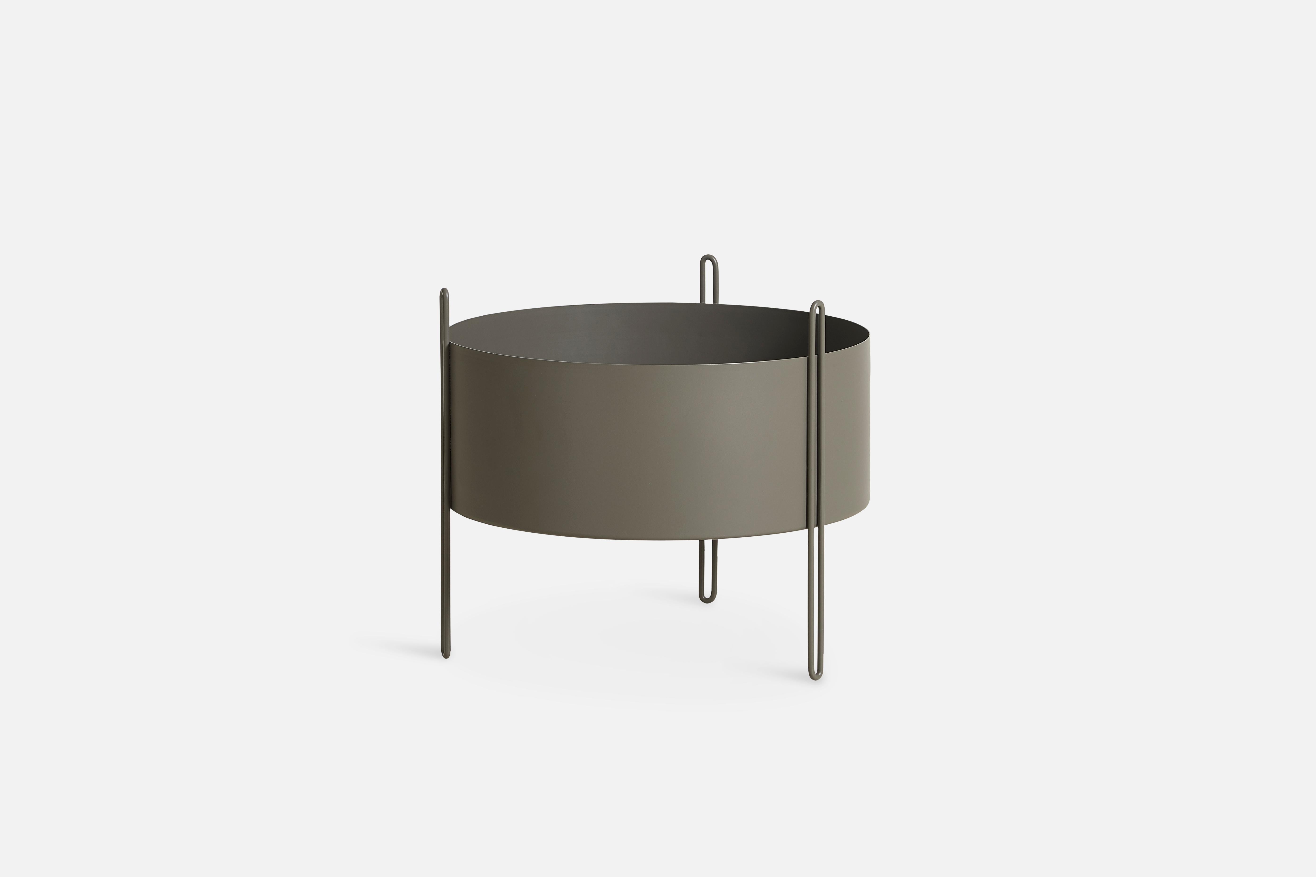 Medium taupe pidestall planter by Emilie Stahl Carlsen.
Materials: metal.
Dimensions: D 40 x H 35 cm.
Available in grey, taupe or black and in 3 sizes: D 15 x H 15, D 40 x H 35, D 40 x H 55 cm.

Emilie Stahl Carlsen is a Nor wegian designer who