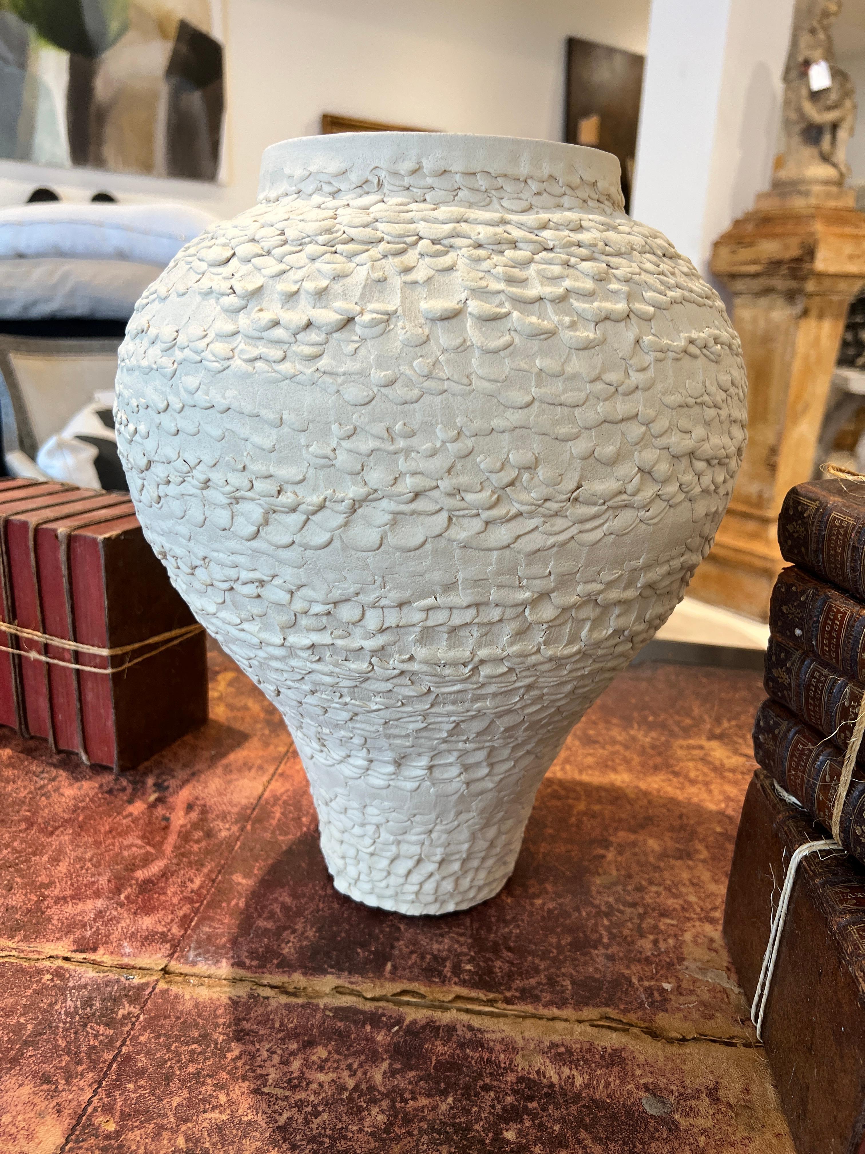 Hand applied texture to lovely shaped vase by a Louisiana artist.