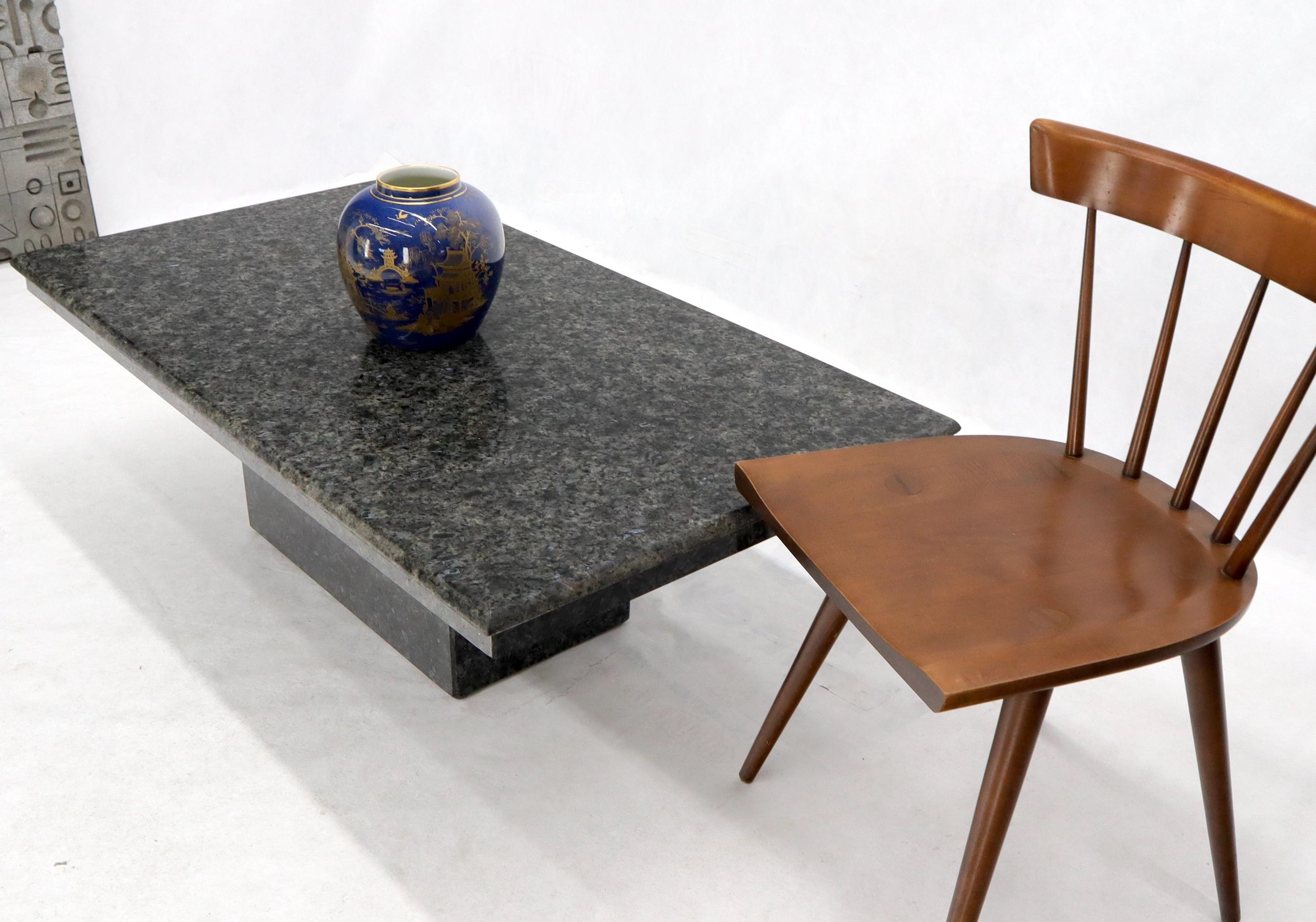 Black granite not marble Mid-Century Modern rectangular coffee table. Measures: 51 x 28.